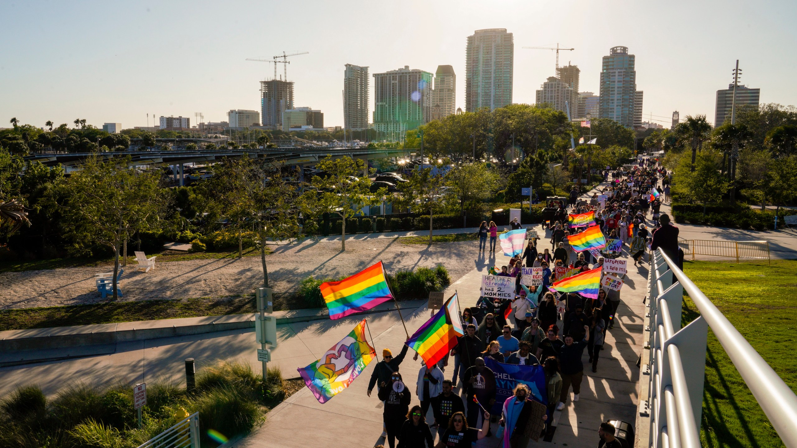 FILE - Marchers make their way toward the St. Pete Pier in St. Petersburg, Fla., on March 12, 2022, during a march to protest the controversial "Don't say gay" bill passed by Florida's Republican-led legislature. For many of those who live in Florida, recent months in 2023 have brought some changes — many linked to Gov. Ron DeSantis. (Martha Asencio-Rhine/Tampa Bay Times via AP, File)