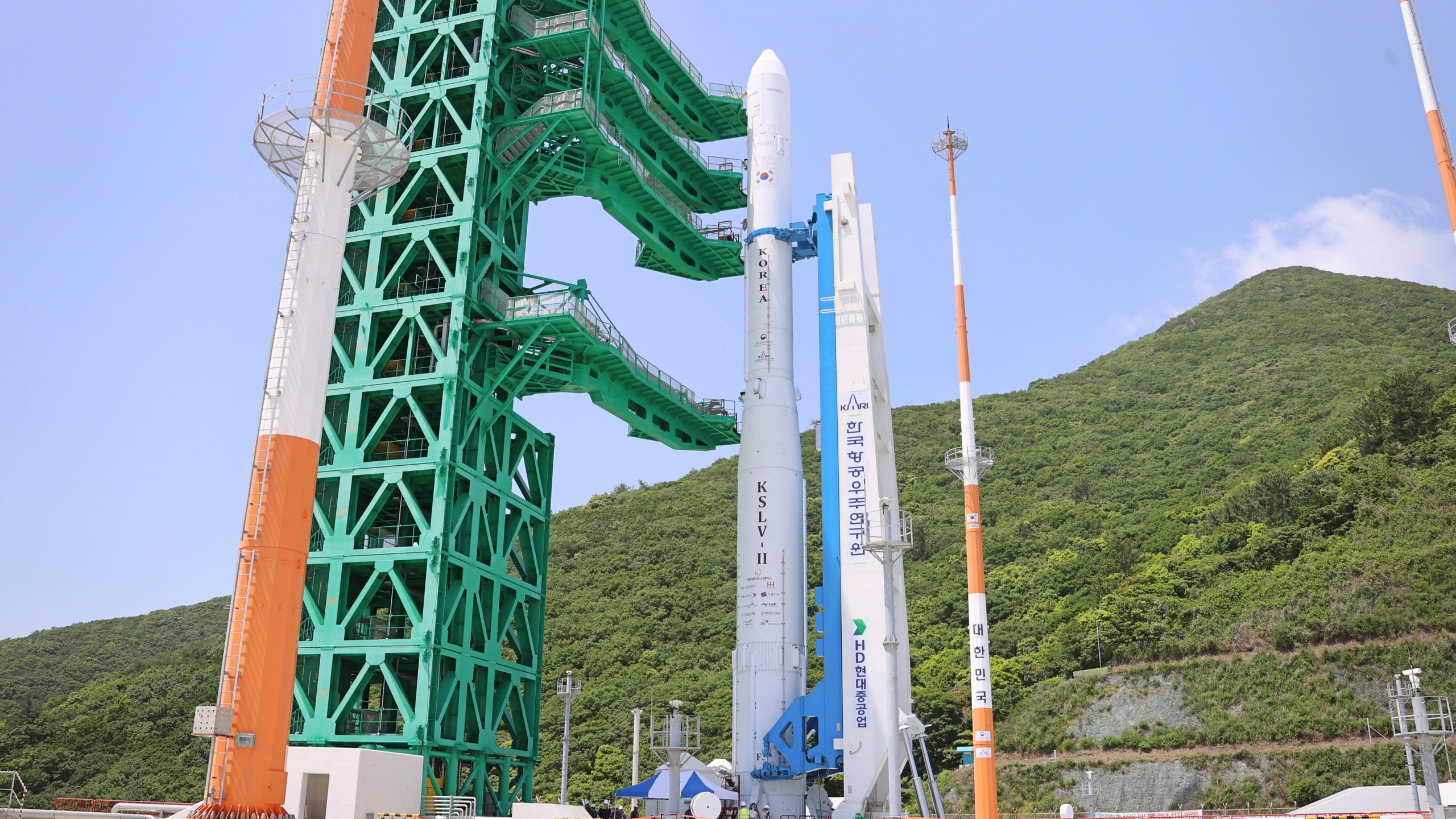 In this photo released by the Korea Aerospace Research Institute, the Nuri rocket sits on its launch pad at the Naro Space Center in Goheung, South Korea, Tuesday, May 23, 2023. South Korea was set to launch its first commercial-grade satellite, on Wednesday as rival North Korea(Korea Aerospace Research Institute via AP)