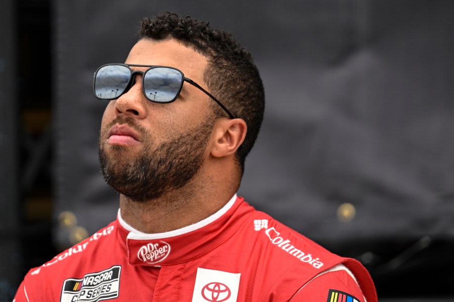 Bubba Wallace looks on prior to a NASCAR Cup Series auto race at Darlington Raceway, Sunday, May 14, 2023, in Darlington, S.C. (AP Photo/Matt Kelley)