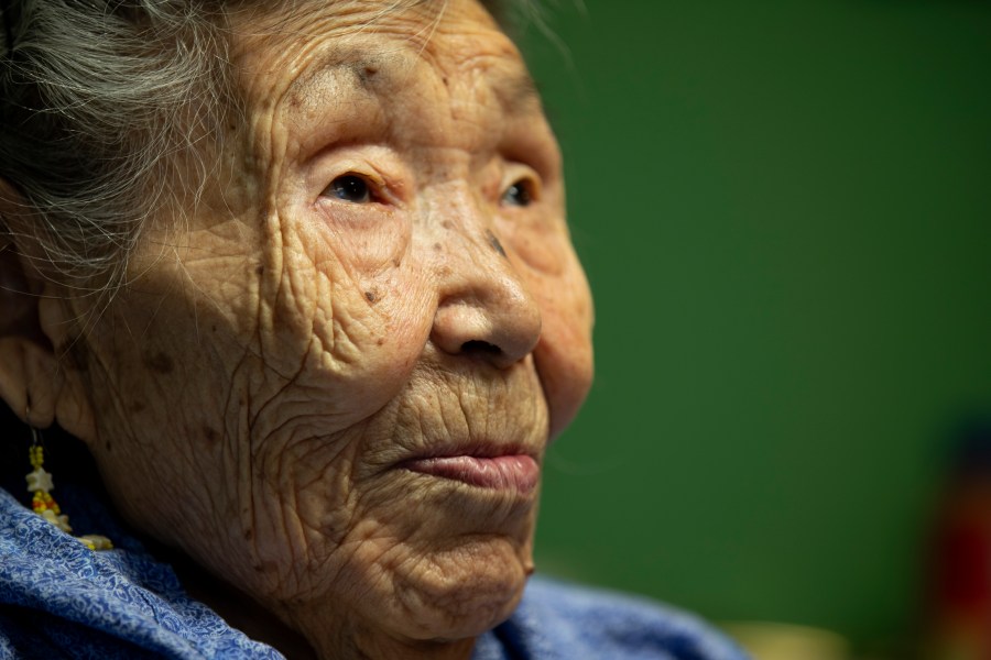 FILE - Lizzie Chimiugak looks on at her home on Monday, Jan. 20, 2020, in Toksook Bay, Alaska. Chimiugak, who turned 90 years old on Monday, is scheduled to be the first person counted in the 2020 U.S. Census on Tuesday. The share of seniors age 65 or older in the U.S. grew by more than a third, while the share of children declined, particularly among those under age 5, according to new figures from the 2020 census released Thursday, May 25, 2023. (AP Photo/Gregory Bull, File)