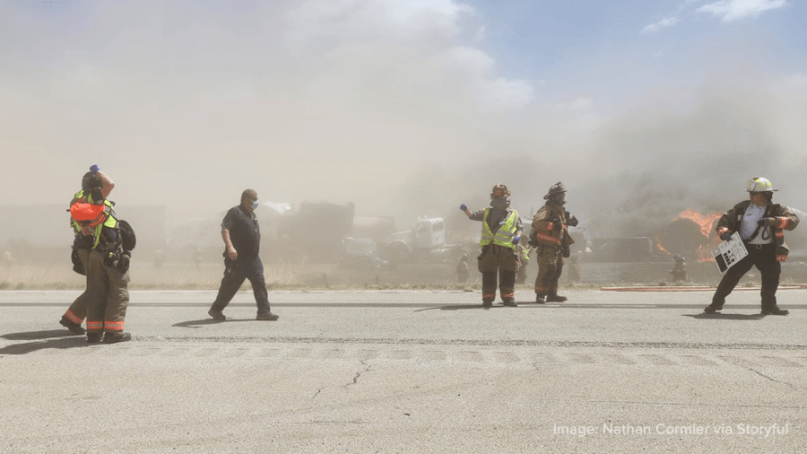 Firefighters respond to a pileup during a dust storm in Montgomery County, Illinois on Monday, May 1, 2023.