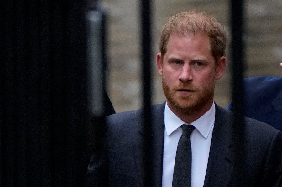 FILE - Britain's Prince Harry arrives at the Royal Courts Of Justice in London, Tuesday, March 28, 2023. The Duke of Sussex is scheduled to testify in the High Court after his lawyer presents opening statements Monday, June 5, 2023 in his case alleging phone hacking. It’s the first of Harry’s several legal cases against the media to go to trial and one of three alleging tabloid publishers unlawfully snooped on him. (AP Photo/Alastair Grant, File)