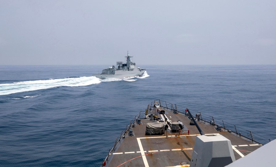 In this photo provided by the U.S. Navy, the USS Chung-Hoon observes a Chinese navy ship conduct what it called an "unsafe” Chinese maneuver in the Taiwan Strait, Saturday, June 3, 2023, in which the Chinese navy ship cut sharply across the path of the American destroyer, forcing the U.S. ship to slow to avoid a collision. The incident occurred as the American destroyer and Canadian frigate HMCS Montreal were conducting a so-called “freedom of navigation” transit of the strait between Taiwan and mainland China. (Mass Communication Specialist 1st Class Andre T. Richard/U.S. Navy via AP)