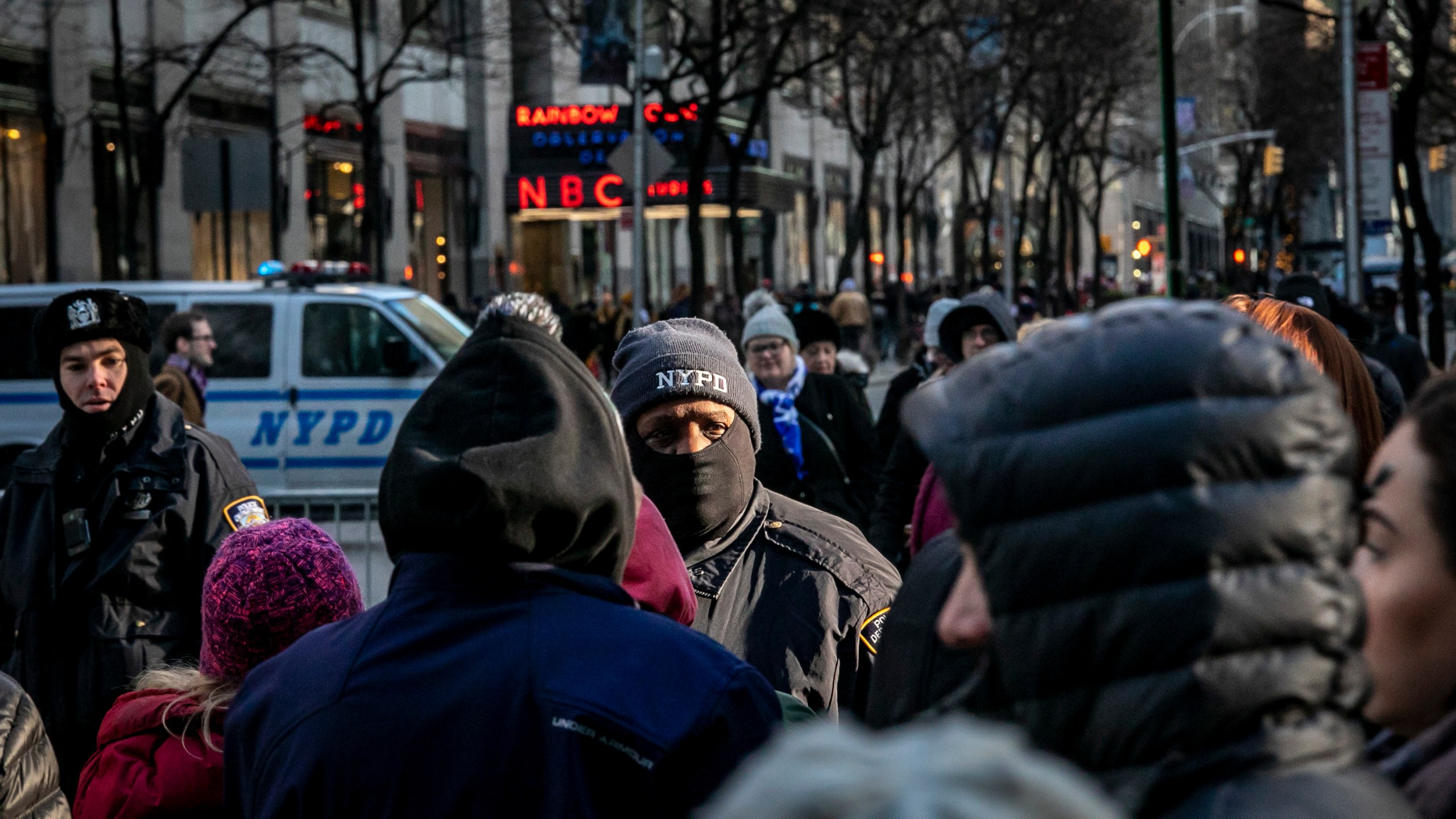 FILE - NYPD officers patrol the surrounding areas at Rockefeller Center in New York on Dec. 19, 2019. A court-appointed federal monitor reported Monday, June 5, 2023, that New York City's reliance on the tactic known as “stop and frisk" as part of a new initiative to combat gun violence is harming communities of color and running afoul of the law. (AP Photo/Bebeto Matthews, File)