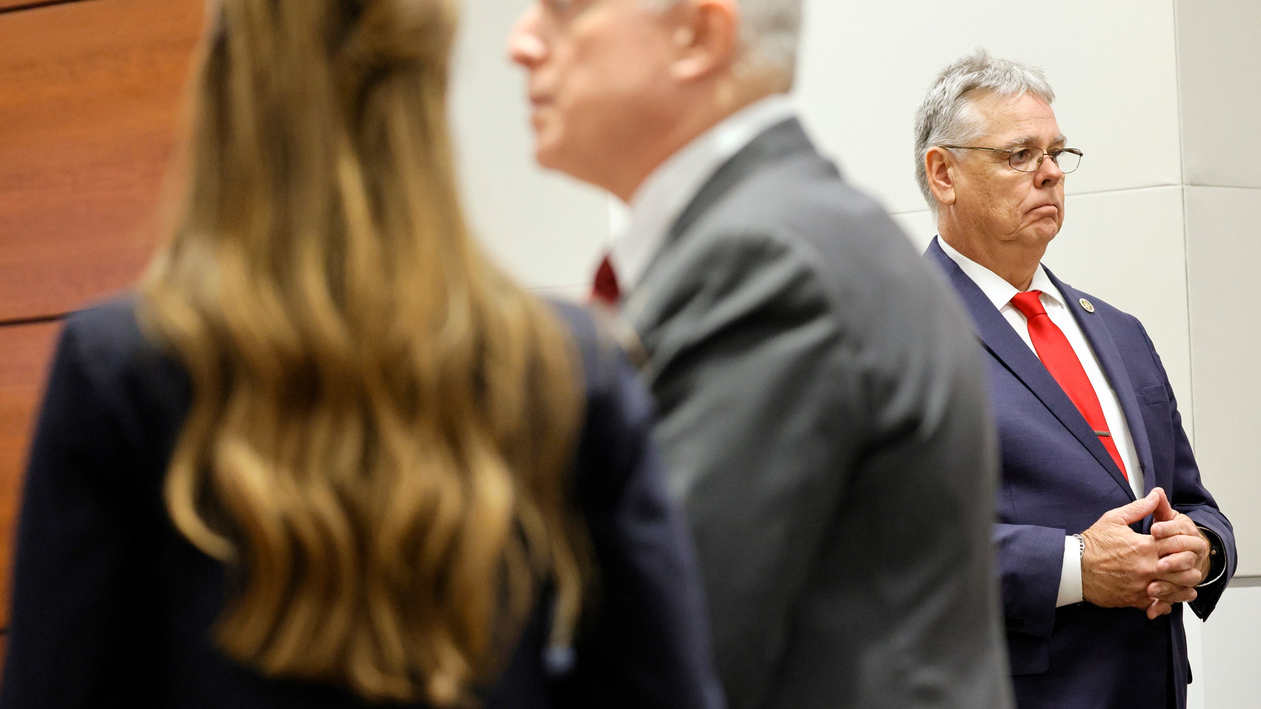 Former Marjory Stoneman Douglas High School School Resource Officer Scot Peterson, right, is shown prior to opening statements in his trial at the Broward County Courthouse in Fort Lauderdale on Wednesday, June 7, 2023. Assistant State Attorneys Kristen Gomes and Steven Klinger are shown at left. (Amy Beth Bennett/South Florida Sun-Sentinel via AP, Pool)