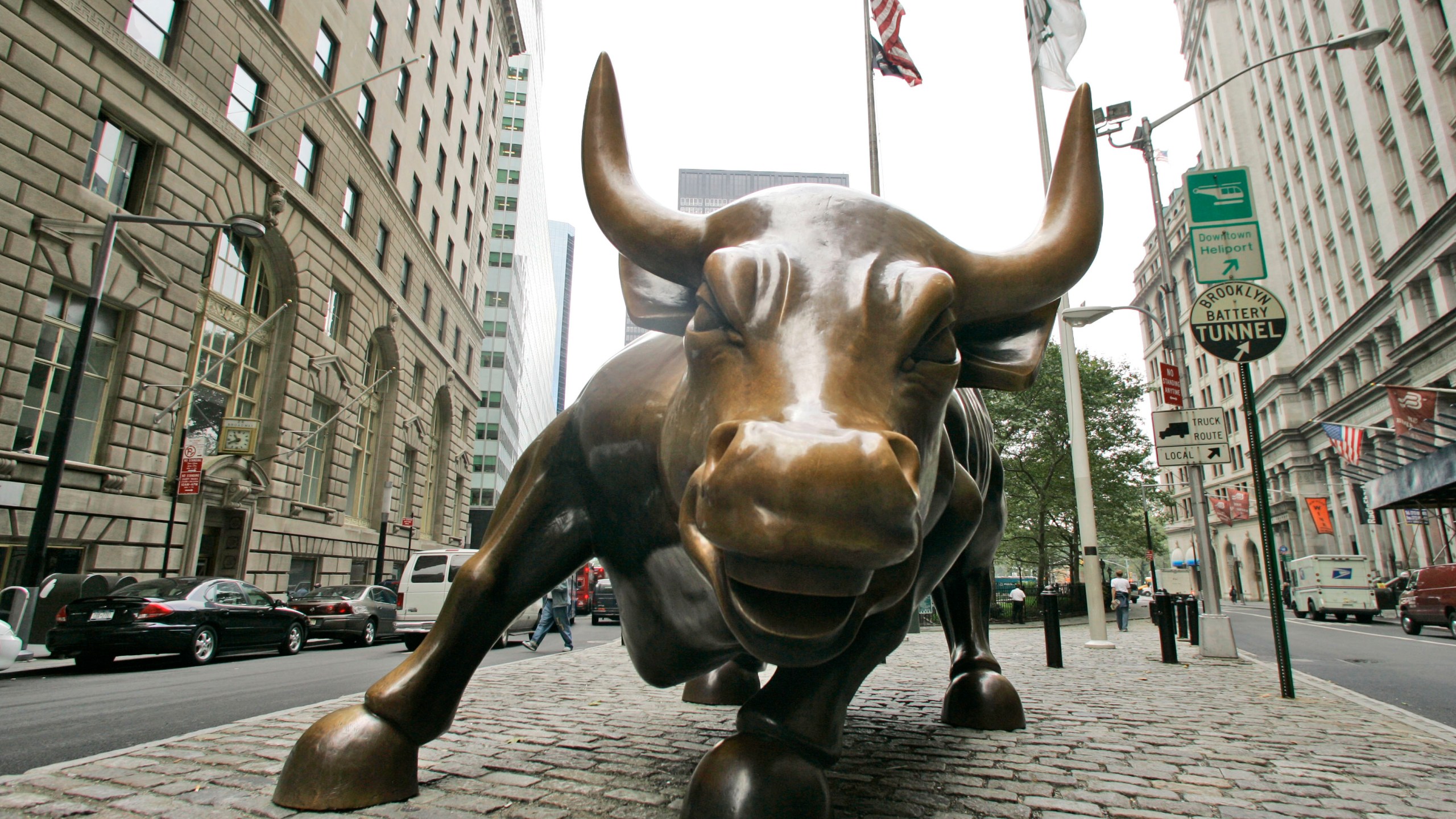 FILE- This Oct. 18, 2008 file photo shows the Charging Bull sculpture in New York City's Financial District. The S&P 500 is now in what Wall Street refers to as a bull market, meaning the index has risen 20% or more from its most recent low. (AP Photo/Mary Altaffer, File)