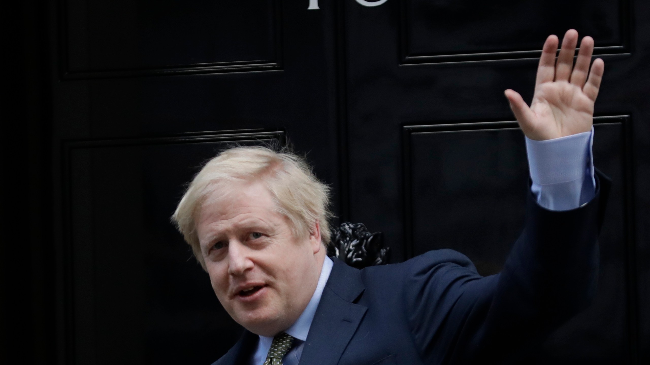 FILE - Britain's Prime Minister Boris Johnson returns to 10 Downing Street after meeting with Queen Elizabeth II at Buckingham Palace, London, on Friday, Dec. 13, 2019. Former U.K. Prime Minister Johnson says he’s quitting as a lawmaker after being told he will be sanctioned for misleading Parliament. Johnson quit on Friday, June 9, 2023 after receiving the results of an investigation by lawmakers over misleading statements he made to Parliament about a slew of gatherings in government that breached pandemic lockdown rules.(AP Photo/Matt Dunham, File)