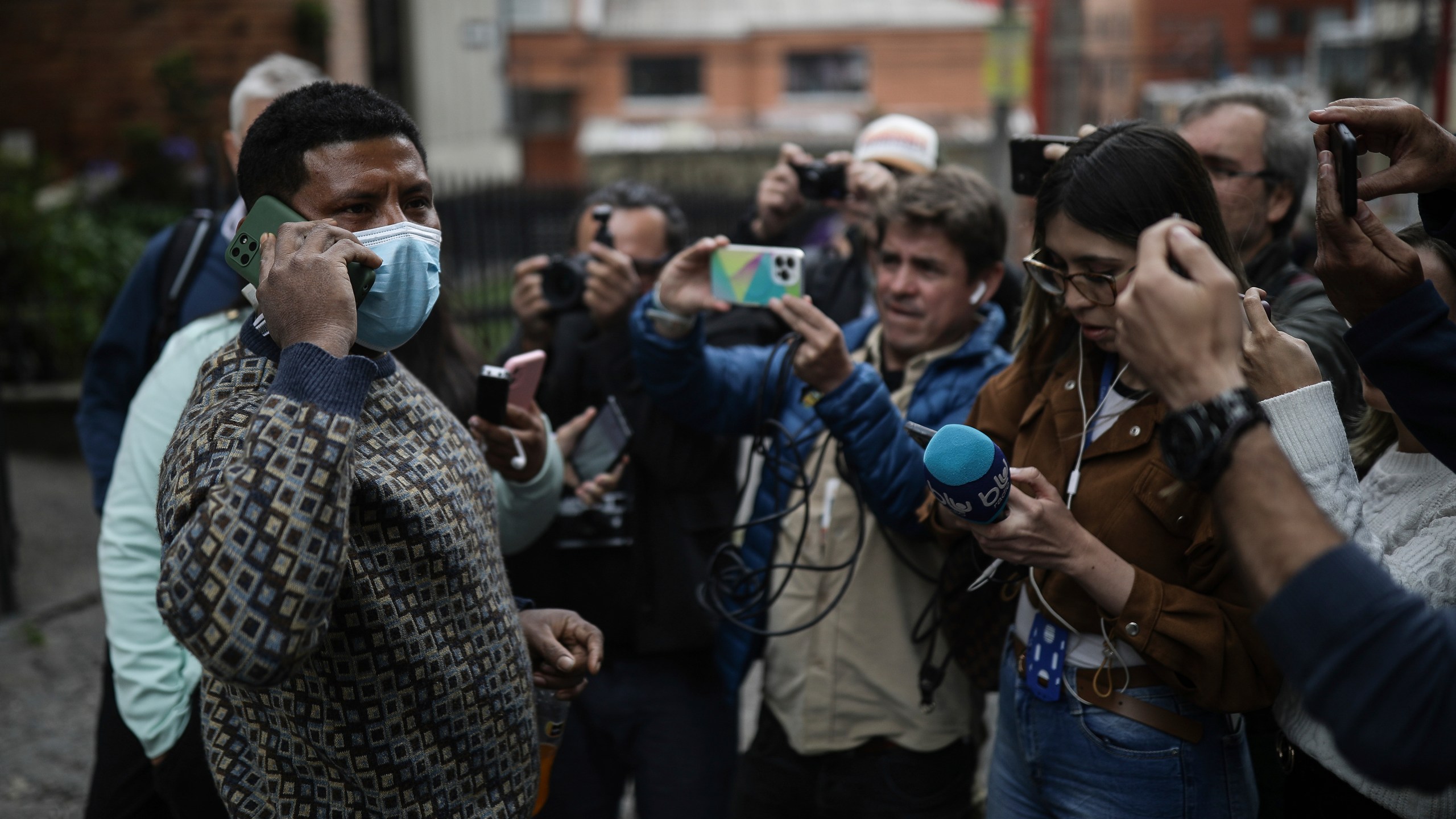 Manuel Ranoque, father of two of the youngest Indigenous children who survived an Amazon plane crash that killed three adults, and then braved the jungle for 40 days before being found alive, speaks to the media from the entrance of the military hospital where the children are receiving medical attention, in Bogota, Colombia, Sunday, June 11, 2023. (AP Photo/Ivan Valencia)