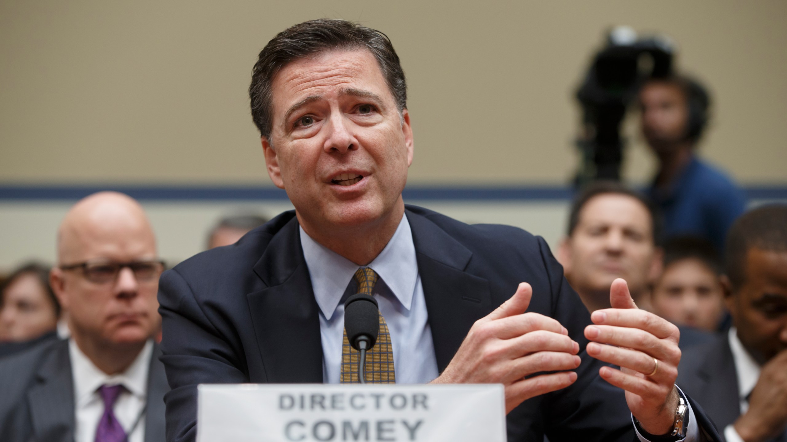 FILE - FBI Director James Comey testifies on Capitol Hill in Washington before the House Oversight Committee to explain his agency's recommendation to not prosecute Hillary Clinton on July 7, 2016. (AP Photo/J. Scott Applewhite, File)