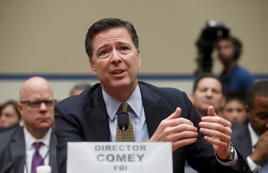 FILE - FBI Director James Comey testifies on Capitol Hill in Washington before the House Oversight Committee to explain his agency's recommendation to not prosecute Hillary Clinton on July 7, 2016. (AP Photo/J. Scott Applewhite, File)