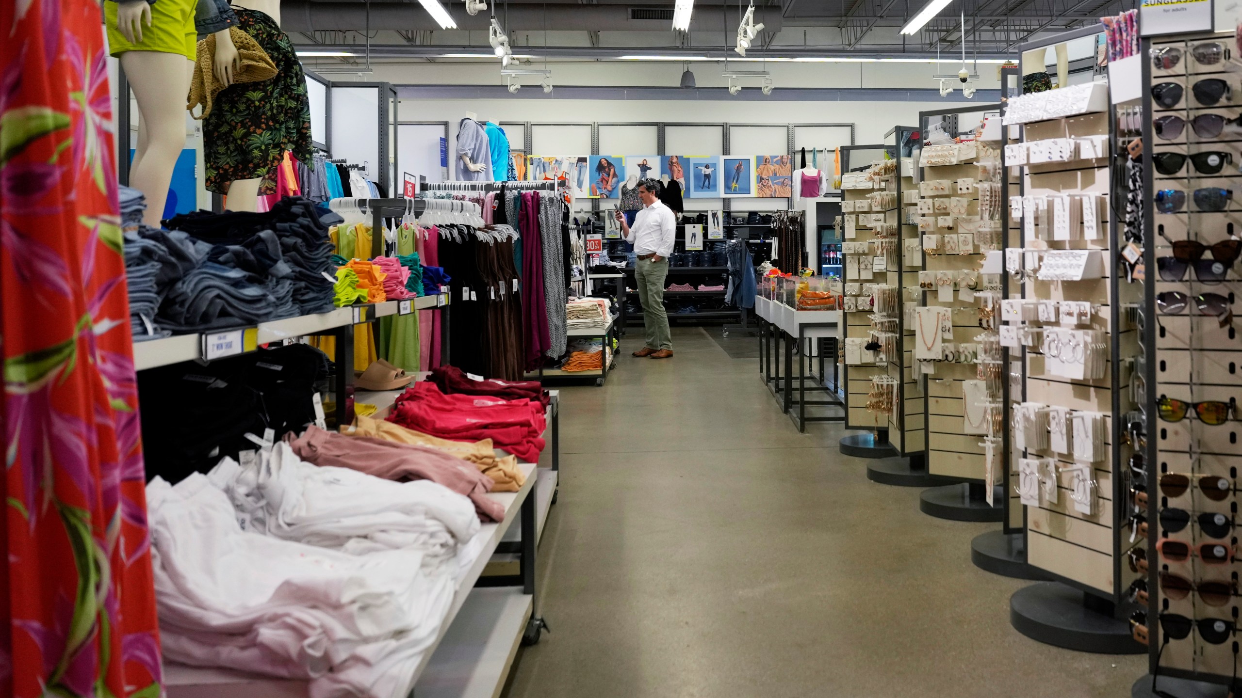 A customer shops at a retail store in Vernon Hills, Ill., Monday, June 12, 2023. On Tuesday, the Labor Department reports on U.S. consumer prices for May. (AP Photo/Nam Y. Huh)