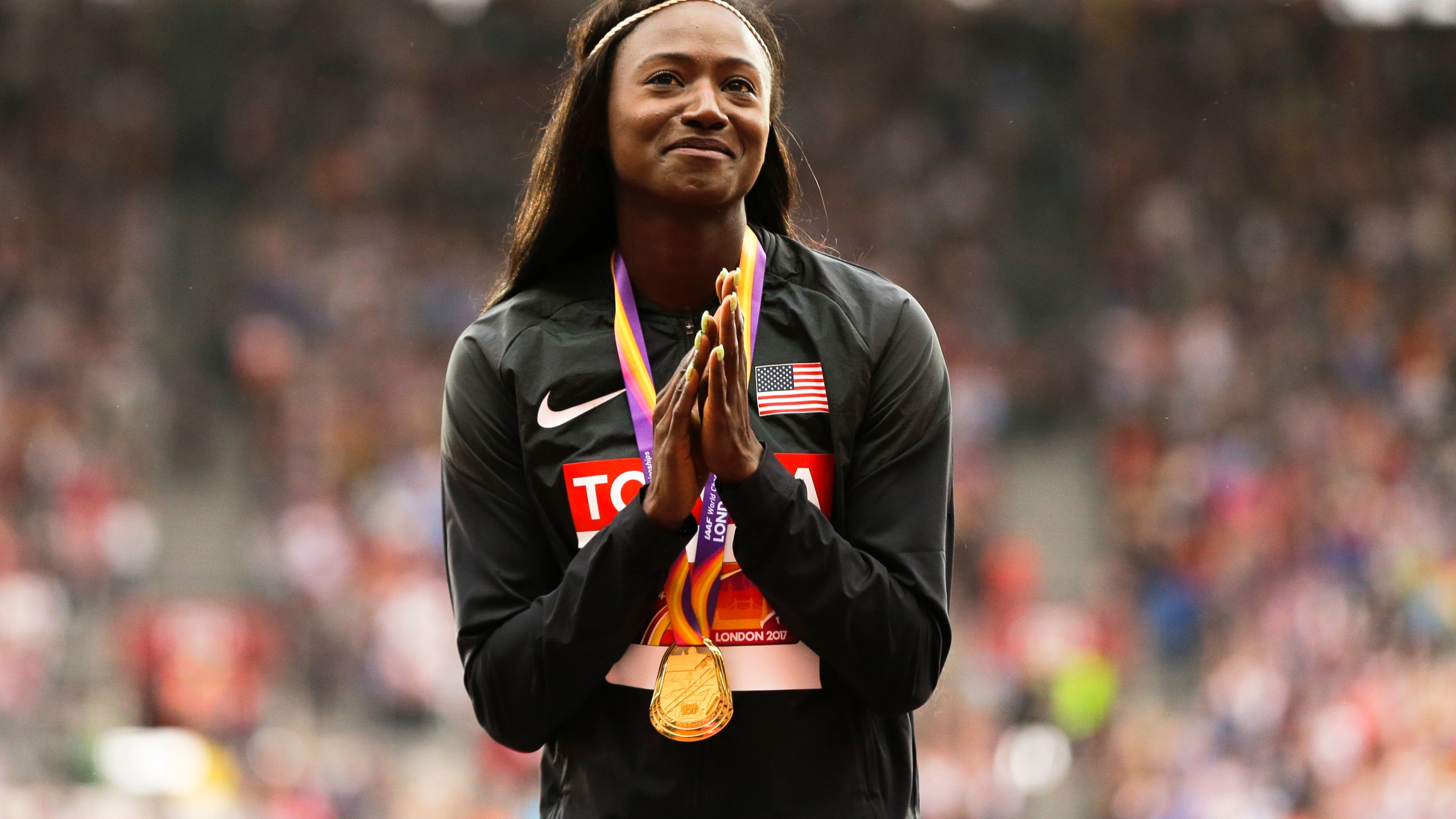 FILE - United States' Tori Bowie gestures after receiving the gold medal she won in the women's 100m final during the World Athletics Championships in London, Monday, Aug. 7, 2017. U.S. Olympic champion sprinter Tori Bowie died from complications of childbirth, according to an autopsy report. Bowie, who won three medals at the 2016 Rio de Janeiro Games, was found dead last month. She was 32. (AP Photo/Alastair Grant, File)