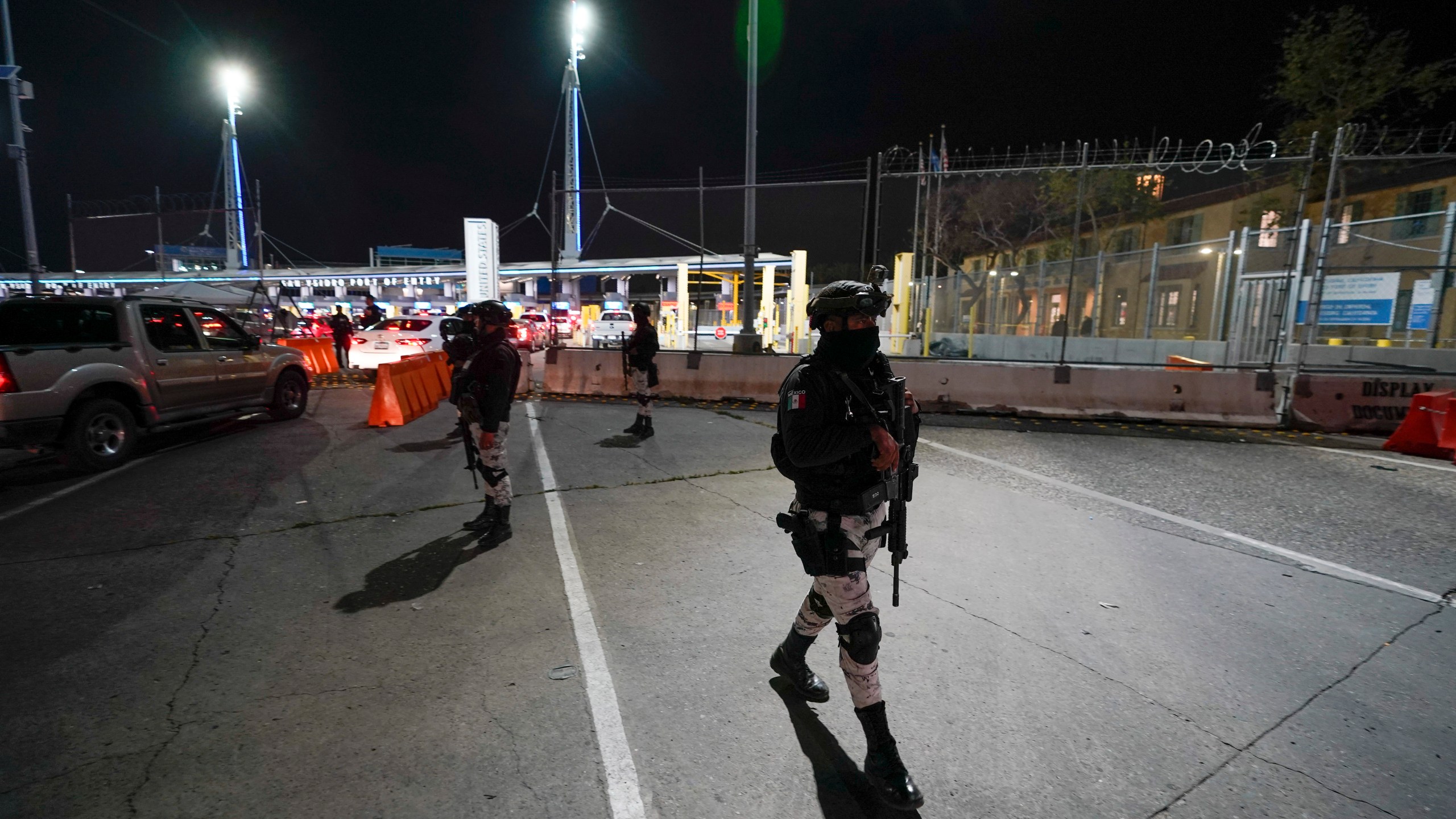 FILE - Mexican National Guards patrol among the lanes of cars entering the San Ysidro Port of Entry in Tijuana, Mexico, May 11, 2023. Montserrat Caballero, the mayor of the Mexican border city of Tijuana, said on June 12, 2023 she has decided to go live at an army base for her own safety, after she received threats. (AP Photo/Gregory Bull, File)