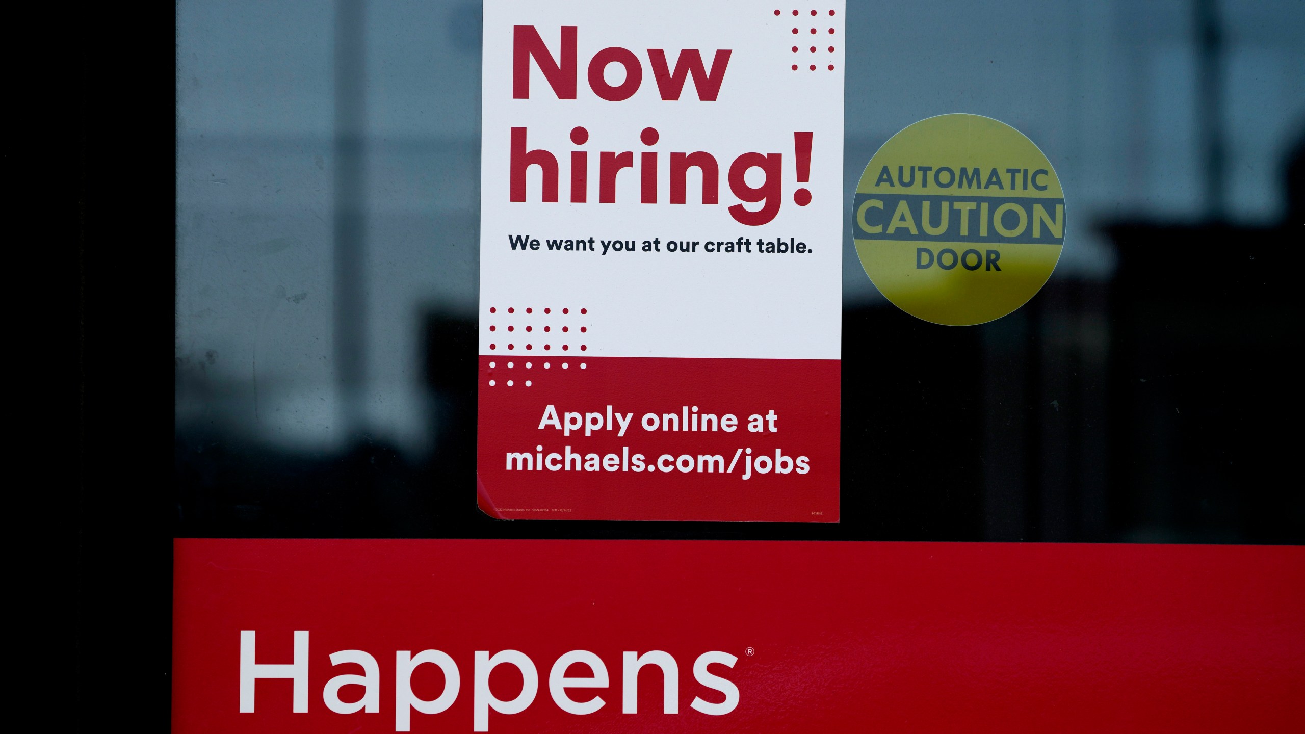 A hiring sign is displayed at a retail store in Downers Grove, Ill., Wednesday, April 12, 2023. On Thursday, the Labor Department reports on the number of people who applied for unemployment benefits last week.(AP Photo/Nam Y. Huh)