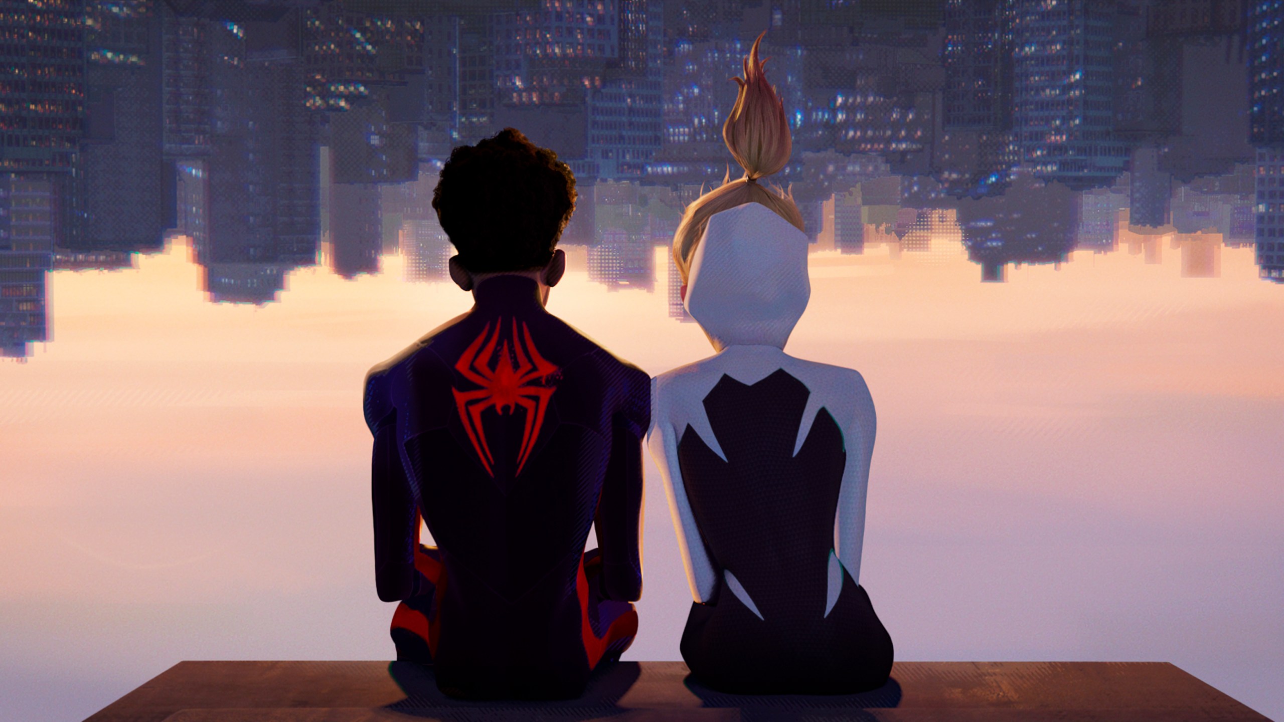 This image released by Sony Pictures Animation shows Miles Morales as Spider-Man, voiced by Shameik Moore, left, and and Spider-Gwen, voiced by Hailee Steinfeld, in a scene from Columbia Pictures and Sony Pictures Animation's "Spider-Man: Across the Spider-Verse." (Sony Pictures Animation via AP)