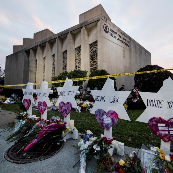 File - A makeshift memorial stands outside the Tree of Life Synagogue in the aftermath of a deadly shooting in Pittsburgh, Oct. 29, 2018. Robert Bowers, a truck driver who shot and killed 11 worshippers at a Pittsburgh synagogue in the nation's deadliest attack on Jewish people, was found guilty, Friday, June 16, 2023. Bowers was tried on 63 criminal counts, including hate crimes resulting in death and obstruction of the free exercise of religion resulting in death. (AP Photo/Matt Rourke, File)