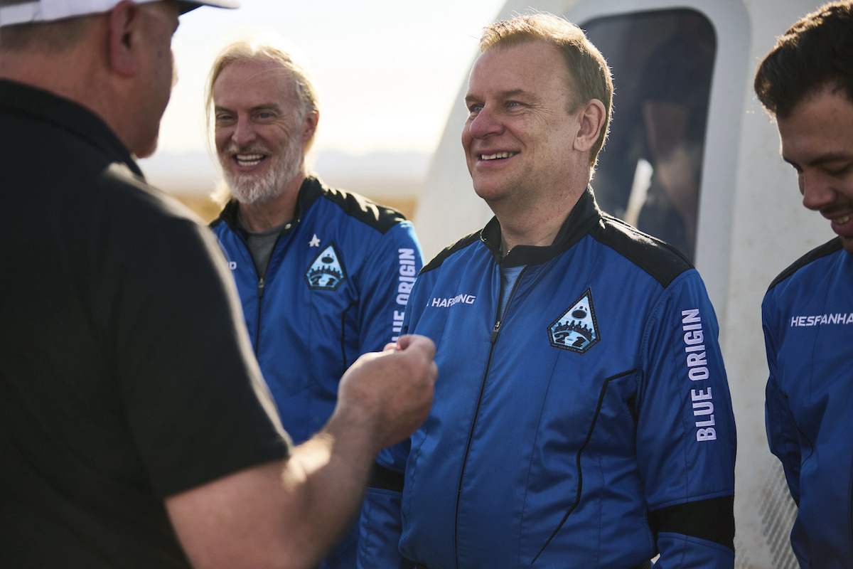 In this photo provided by Blue Origin, NS-21 (New Shepard-21), astronaut Hamish Harding receives his Blue Origin astronaut pin after a successful flight to space on June 4, 2022, in Van Horn, Texas. According to Action Aviation, a company for which Harding serves as chairman, the U.K. businessman was one of the mission specialists onboard a missing submersible carrying five people to view the wreckage of the Titanic that was reported overdue late Sunday, June 18, 2023. (Felix Kunze/Blue Origin via AP)