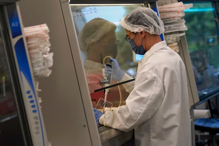 A scientist works in a cellular agriculture lab at Eat Just in Alameda, Calif., Wednesday, June 14, 2023. The U.S. government is allowing the sale of chicken made from animal cells. California companies Upside Foods and Good Meat were granted permission on Wednesday, June 21, 2023 to sell their products by the Agriculture Department. Proponents say this “cultivated meat” is better for animals and the environment because livestock doesn’t need to be raised and killed to produce it. (AP Photo/Jeff Chiu)