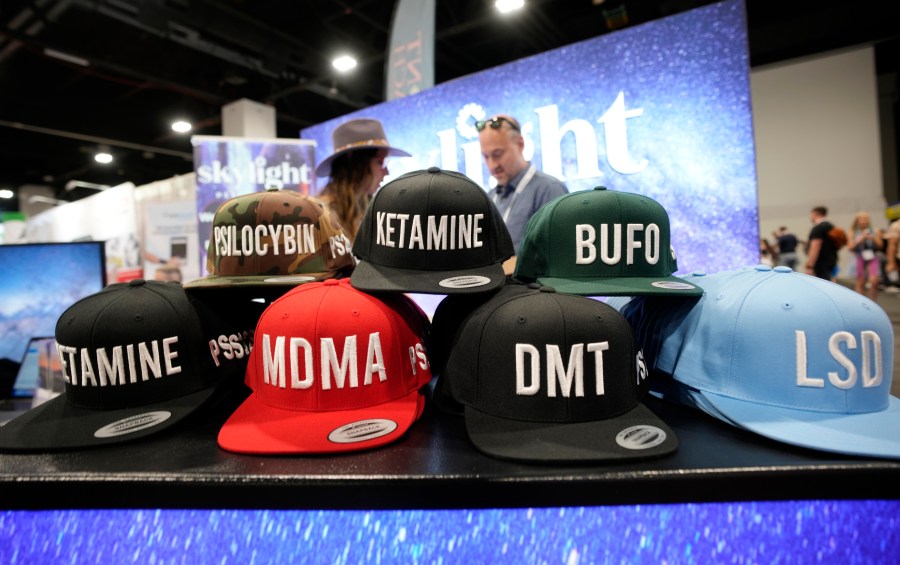 Exhibitor displays goods at the Psychedelic Science conference in the Colorado Convention Center Wednesday, June 21, 2023, in Denver. (AP Photo/David Zalubowski)