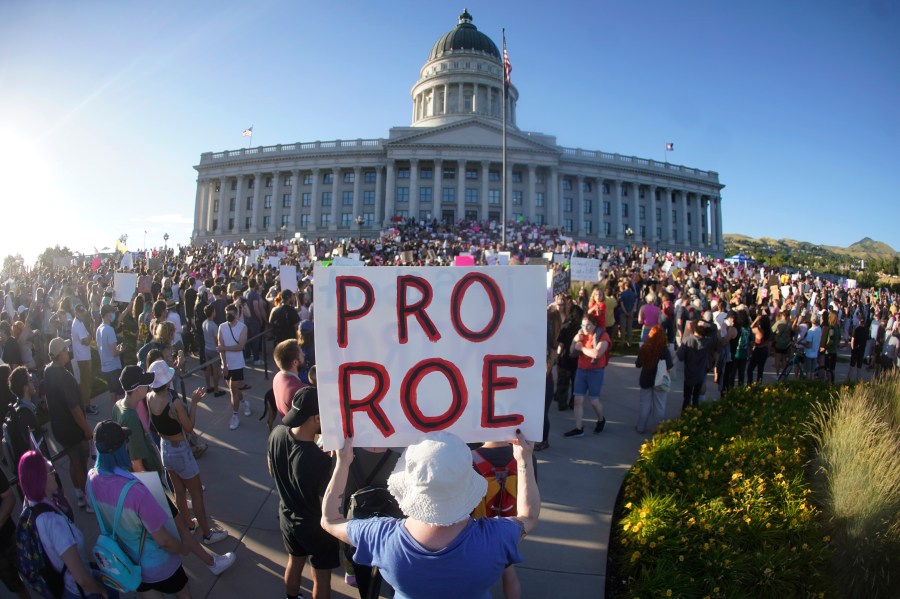 FILE - People attend an abortion-rights rally at the Utah State Capitol in Salt Lake City after the U.S. Supreme Court overturned Roe v. Wade, June 24, 2022. One year ago, the U.S. Supreme Court rescinded a five-decade-old right to abortion, prompting a seismic shift in debates about politics, values, freedom and fairness. (AP Photo/Rick Bowmer, File)