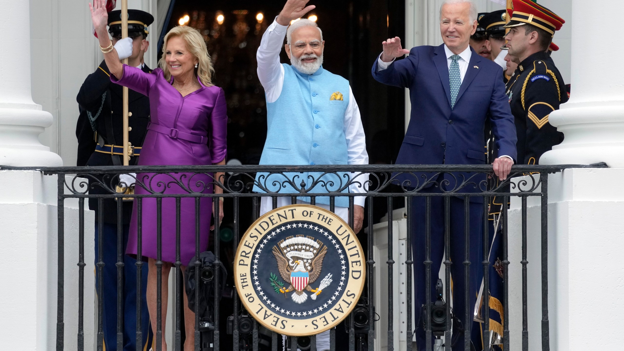 First lady Jill Biden, India's Prime Minister Narendra Modi and President Joe Biden wave from the Blue Room Balcony during an Arrival Ceremony on the South Lawn of the White House, Thursday, June 22, 2023, in Washington. (AP Photo/Manuel Balce Ceneta)