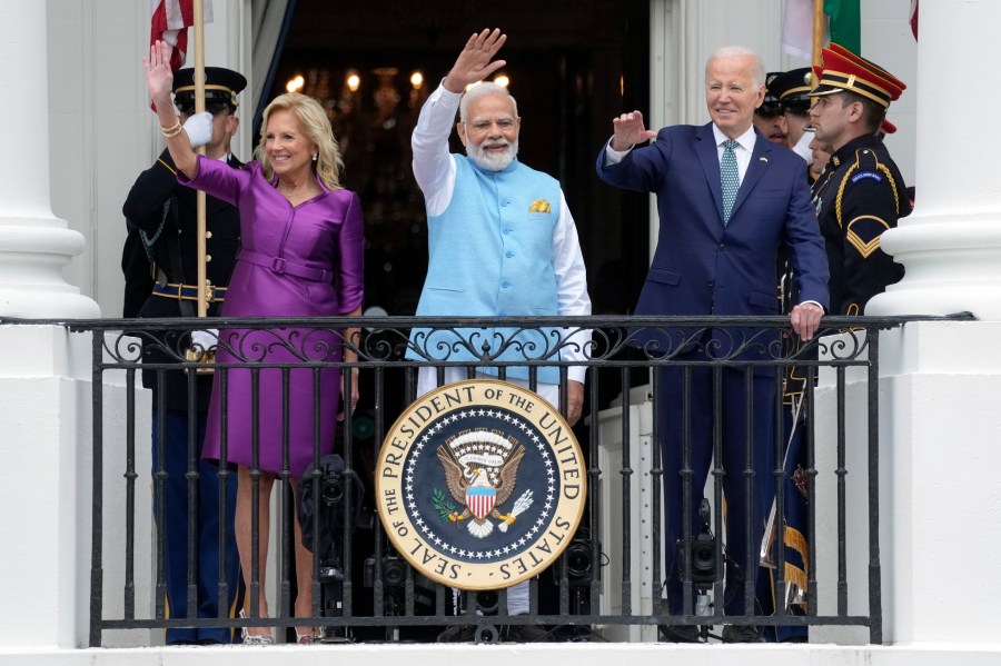 First lady Jill Biden, India's Prime Minister Narendra Modi and President Joe Biden wave from the Blue Room Balcony during an Arrival Ceremony on the South Lawn of the White House, Thursday, June 22, 2023, in Washington. (AP Photo/Manuel Balce Ceneta)