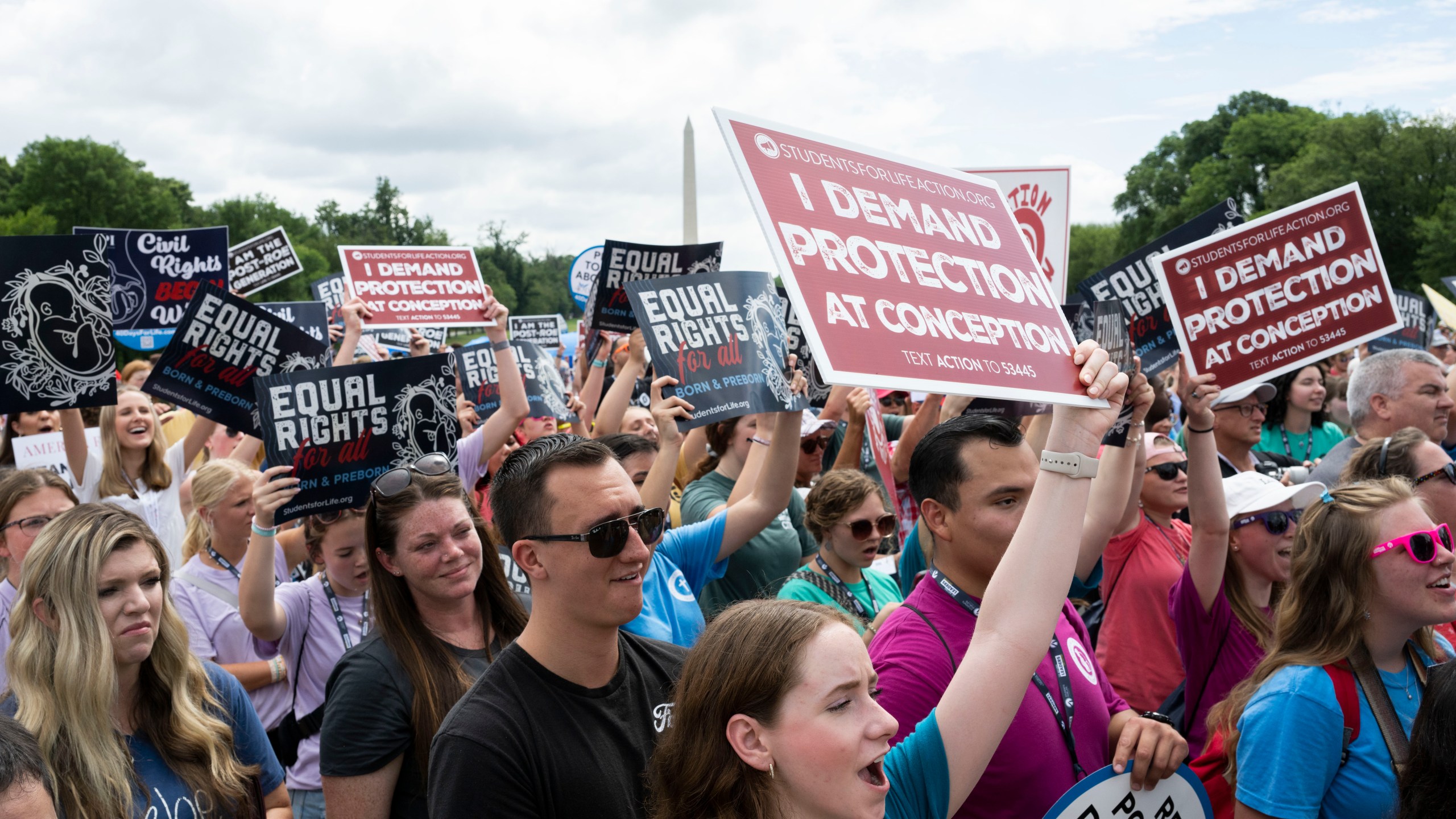 Anti-abortion activists cheer before Republican presidential candidate former Vice President Mike Pence speaks at the National Celebrate Life Rally at the Lincoln Memorial on Saturday, June 24, 2023, in Washington. (AP Photo/Kevin Wolf)