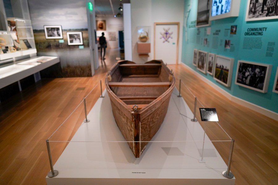 Guests tour the International African American Museum on Friday, June 23, 2023, in Charleston, S.C. Overlooking the old wharf at which nearly half of the enslaved population first entered North America, the 150,000-square foot museum houses exhibits and artifacts exploring how African Americans' labor, perseverance, resistance and cultures shaped the Carolinas, the nation and the world. (AP Photo/Chris Carlson)