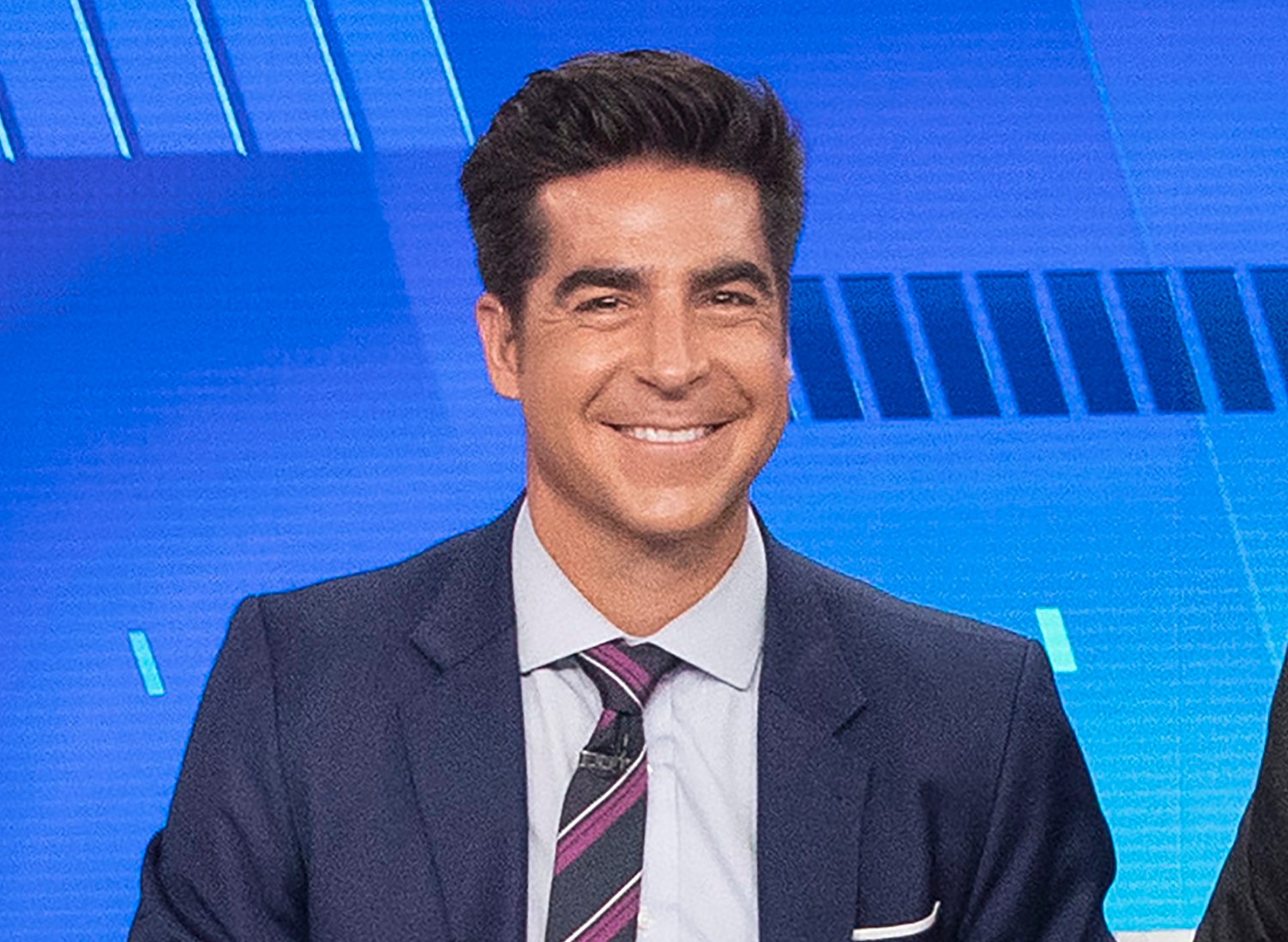 FILE - Jesse Watters appears on Fox News "The Five" in New York on Oct. 10, 2019. Watters will host an opinion show in the time slot formerly occupied by Tucker Carlson, Fox News Channel announced Monday. He will remain a co-host on “The Five,” an evening roundtable discussion show that is hugely popular on the network. (AP Photo/Mary Altaffer, File)