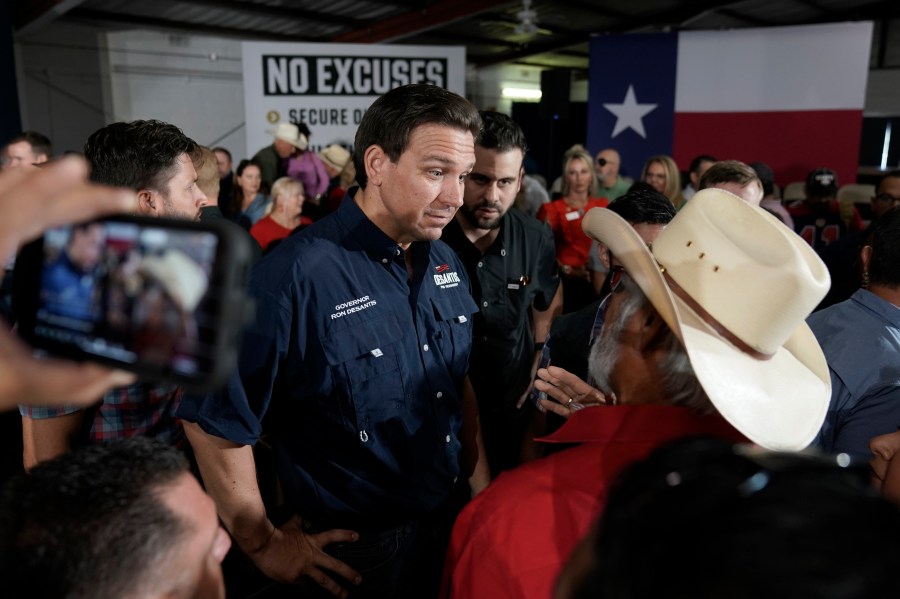 Republican presidential candidate Florida Gov. Ron DeSantis greets supporters during a town hall meeting in Eagle Pass, Texas, Monday, June 26, 2023. (AP Photo/Eric Gay)