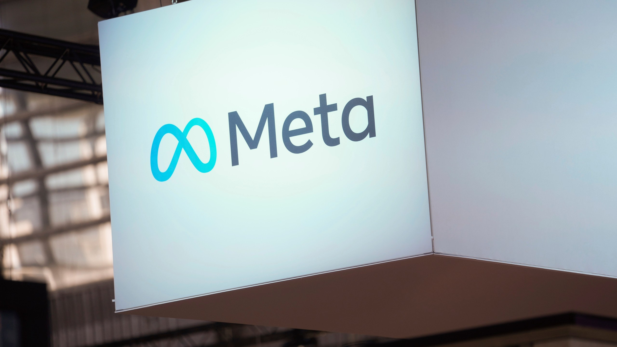 FILE - The Meta logo is seen at the Vivatech show in Paris, France, June 14, 2023. Instagram and Facebook's parent company Meta is adding new parental supervision tools and privacy features to its platforms beginning Tuesday, June 27. The changes come as social media companies face increased scrutiny over how they impact teens' mental health. (AP Photo/Thibault Camus, File)