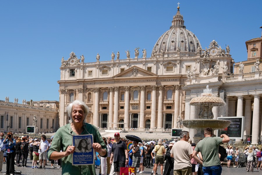 Pietro Orlandi holds a placard with a picture of his sister Emanuela as he arrives in St.Peter's Square prior to Pope Francis' Angelus noon prayer, at the Vatican, Sunday, June 25, 2023. The Pope in his speech remembered the 40th anniversary of the disappearance of Emanuela Orlandi, the 15-year-old daughter of a lay employee of the Holy See, that vanished June 22, 1983, after leaving her family's Vatican City apartment to go to a music lesson in Rome. (AP Photo/Andrew Medichini)