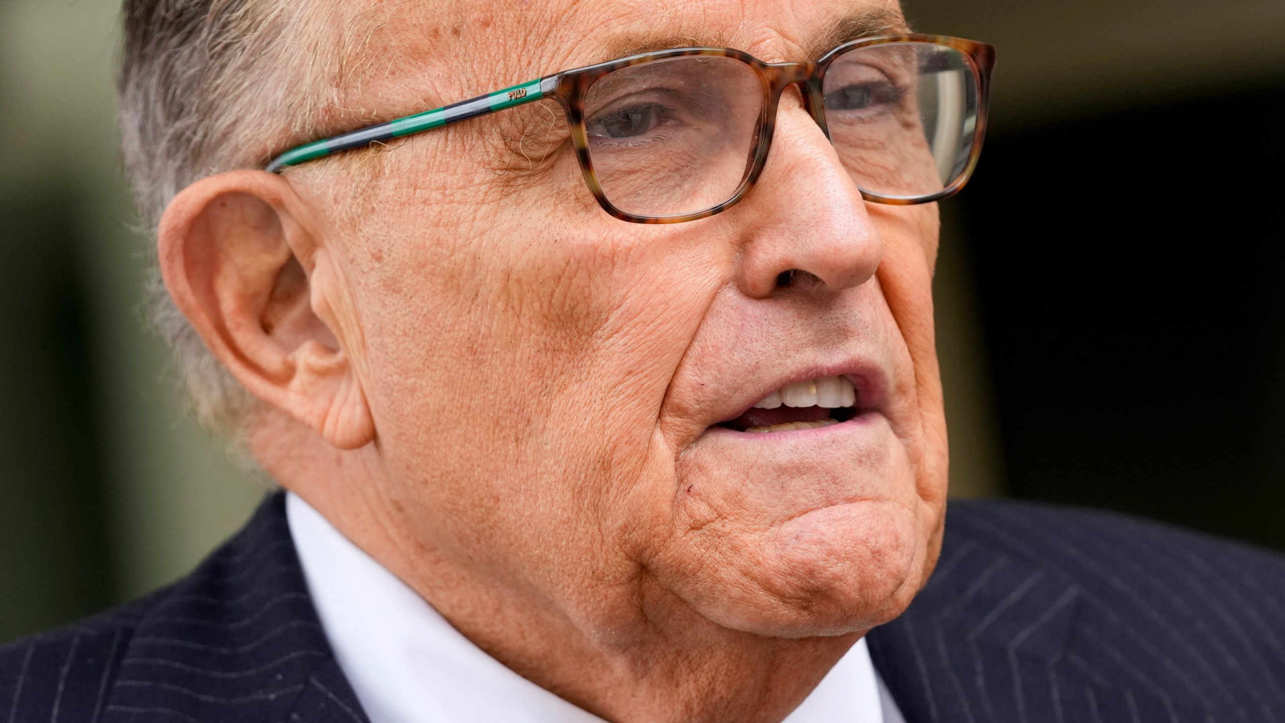 FILE - Rudy Giuliani speaks with reporters as he departs the federal courthouse, May 19, 2023, in Washington. Giuliani, who as a member of Donald Trump's legal team sought to overturn 2020 presidential election results in battleground states, was interviewed recently by investigators with the Justice Department special counsel's office, according to a person familiar with the matter. (AP Photo/Patrick Semansky, File)