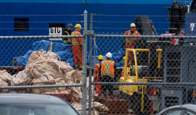 Debris from the Titan submersible, recovered from the ocean floor near the wreck of the Titanic, is unloaded from the ship Horizon Arctic at the Canadian Coast Guard pier in St. John's, Newfoundland on Wednesday, June 28, 2023. (Paul Daly/The Canadian Press via AP)