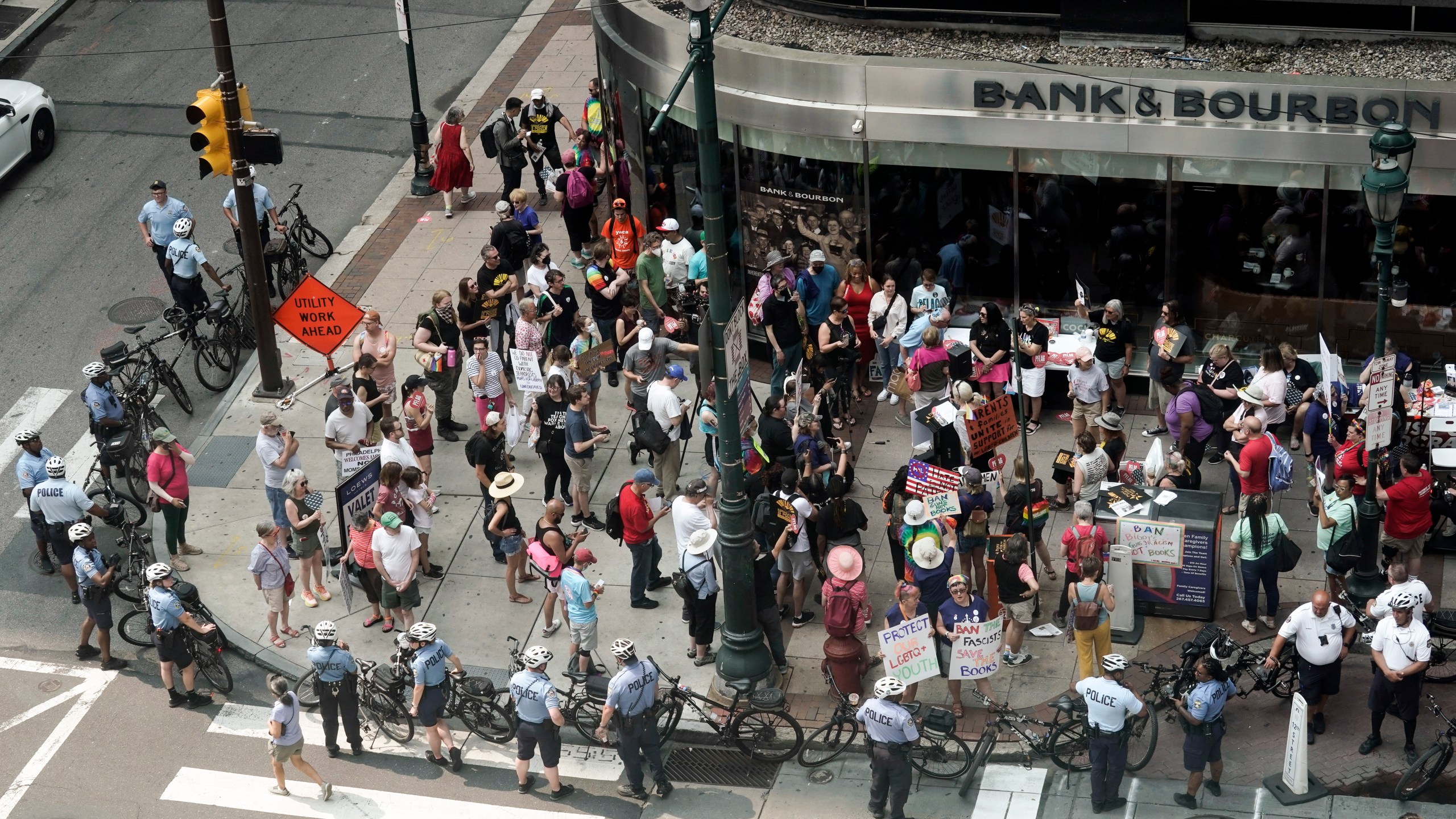 Demonstrators gather outside the Moms for Liberty meeting in Philadelphia, Friday, June 30, 2023. (AP Photo/Matt Rourke)