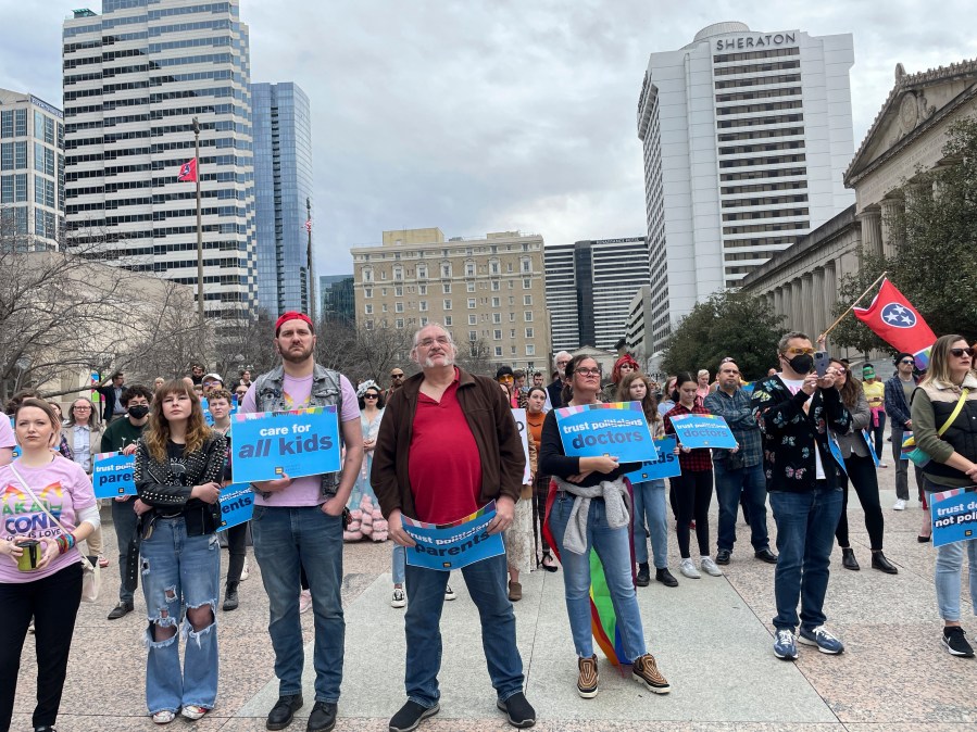 FILE - Advocates gather for a rally at the state Capitol complex in Nashville, Tenn., to oppose a series of bills that target the LGBTQ community, Tuesday, Feb. 14, 2023. Bans on gender-affirming care for minors are to take effect Saturday in Georgia and Tennessee. (AP Photo/Jonathan Mattise, File)