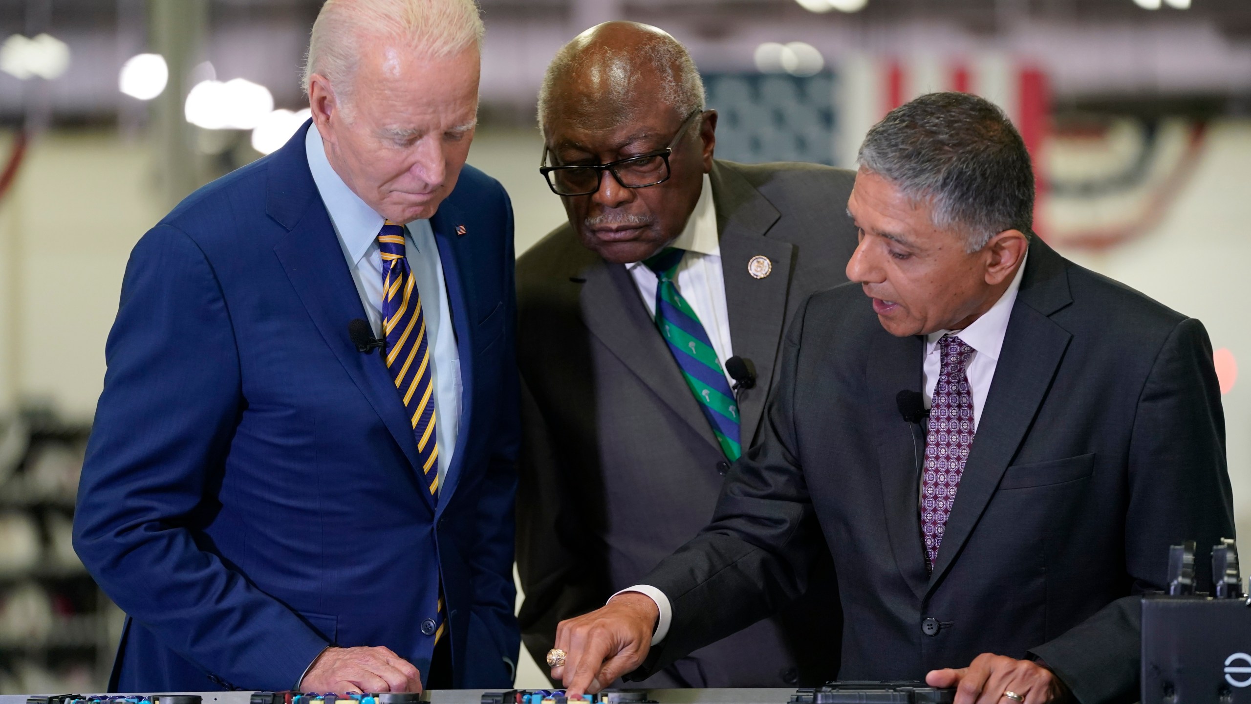 President Joe Biden and Rep. Jim Clyburn, D-S.C., listen during a tour at Flex LTD, Thursday, July 6, 2023, in West Columbia, S.C. (AP Photo/Evan Vucci)