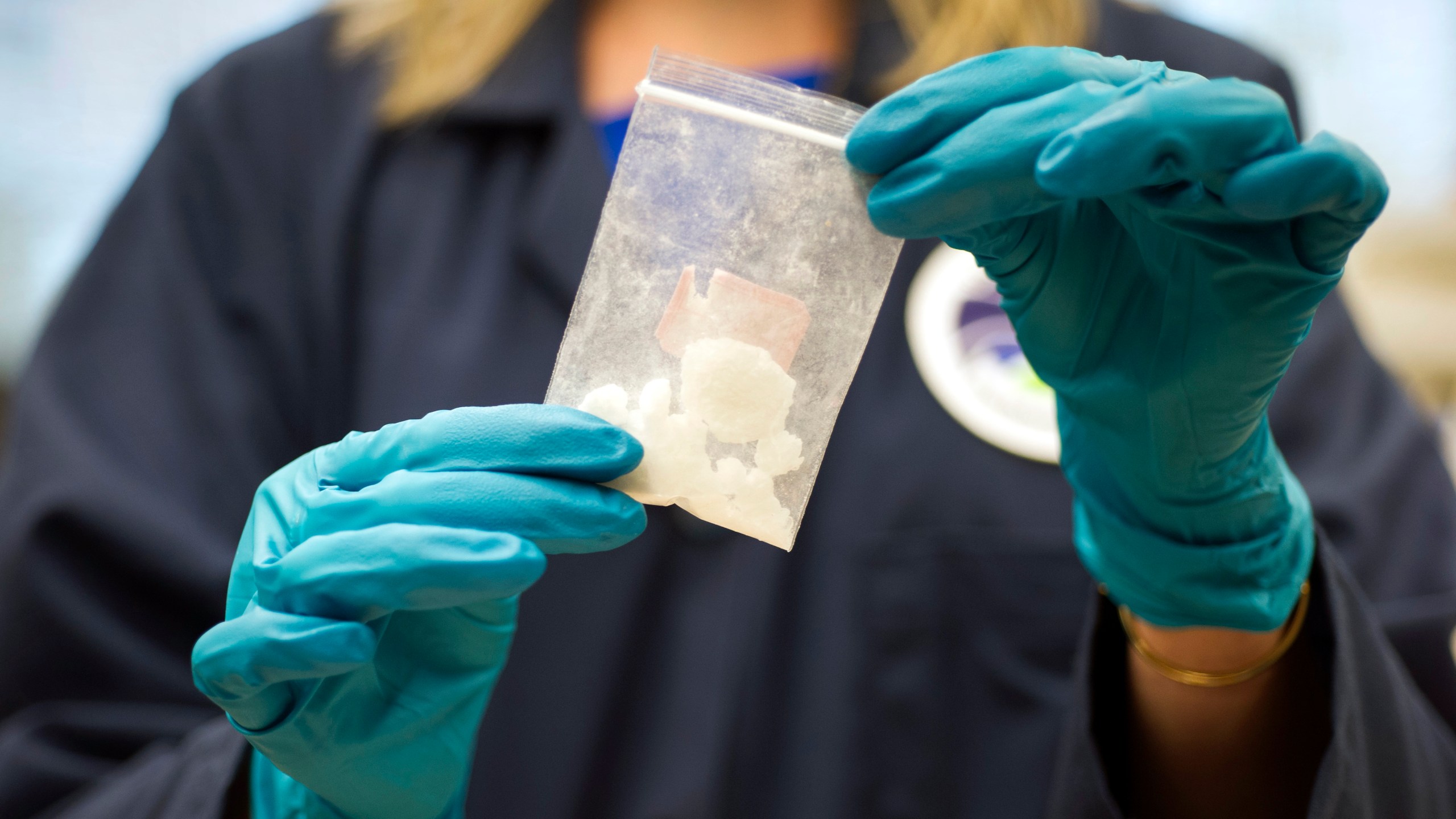 FILE - A bag of 4-fluoro isobutyryl fentanyl which was seized in a drug raid is displayed at the Drug Enforcement Administration (DEA) Special Testing and Research Laboratory in Sterling, Va., on Aug. 9, 2016. China on Friday, July 7, 2023, insisted it is up to the U.S. to “create necessary conditions” for anti-drugs cooperation, following complaints from Washington that Beijing has ignored its calls for a crackdown on precursor chemicals for the highly addictive painkiller fentanyl. (AP Photo/Cliff Owen, File)