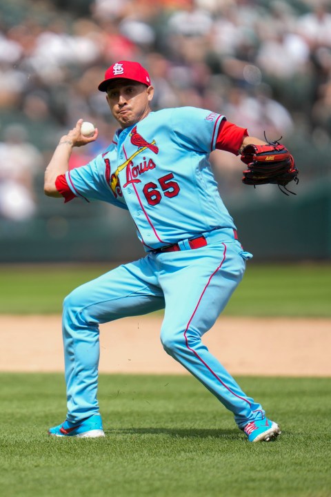 St. Louis Cardinals relief pitcher Giovanny Gallegos throws to first during the eighth inning of a baseball game against the Chicago White Sox Saturday, July 8, 2023, in Chicago. (AP Photo/Erin Hooley)