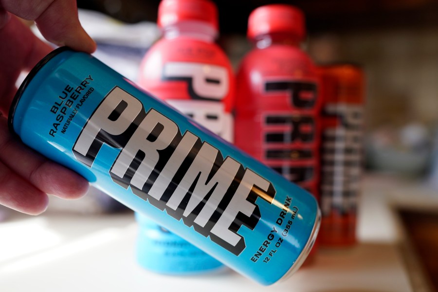 A Prime Energy drink is seen, Friday, March 24, 2023, in Detroit. The influencer-backed energy drink that has earned viral popularity among children is facing scrutiny from lawmakers and health experts over its potentially dangerous levels of caffeine. (AP Photo/Carlos Osorio)