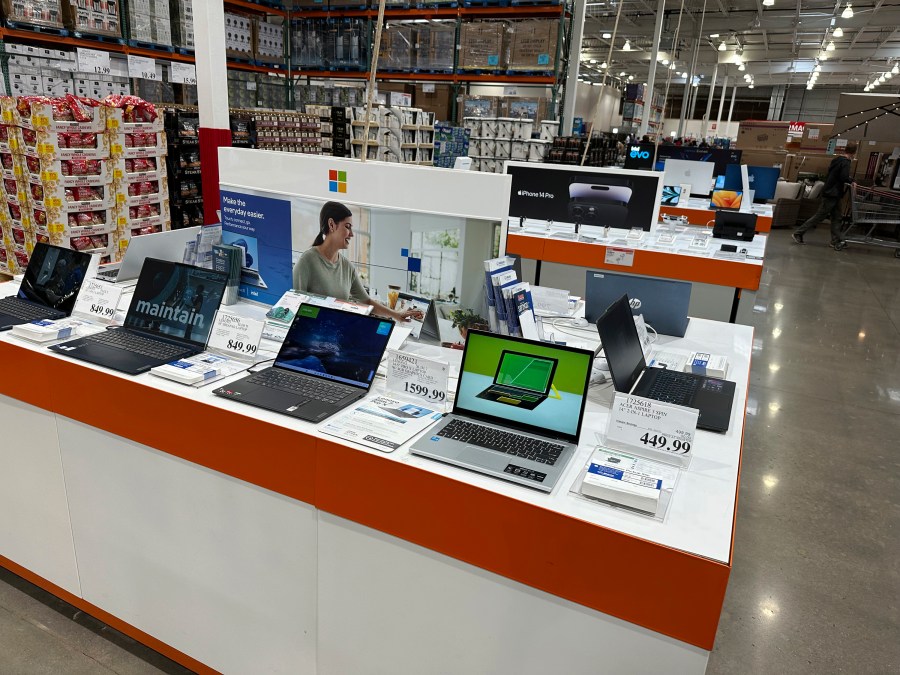 Laptop computers are displayed in a Costco warehouse Monday, June 6, 2023, in Colorado Springs, Colo. On Thursday, the Labor Department reports on U.S. producer prices for June rose just 0.1%. (AP Photo/David Zalubowski)