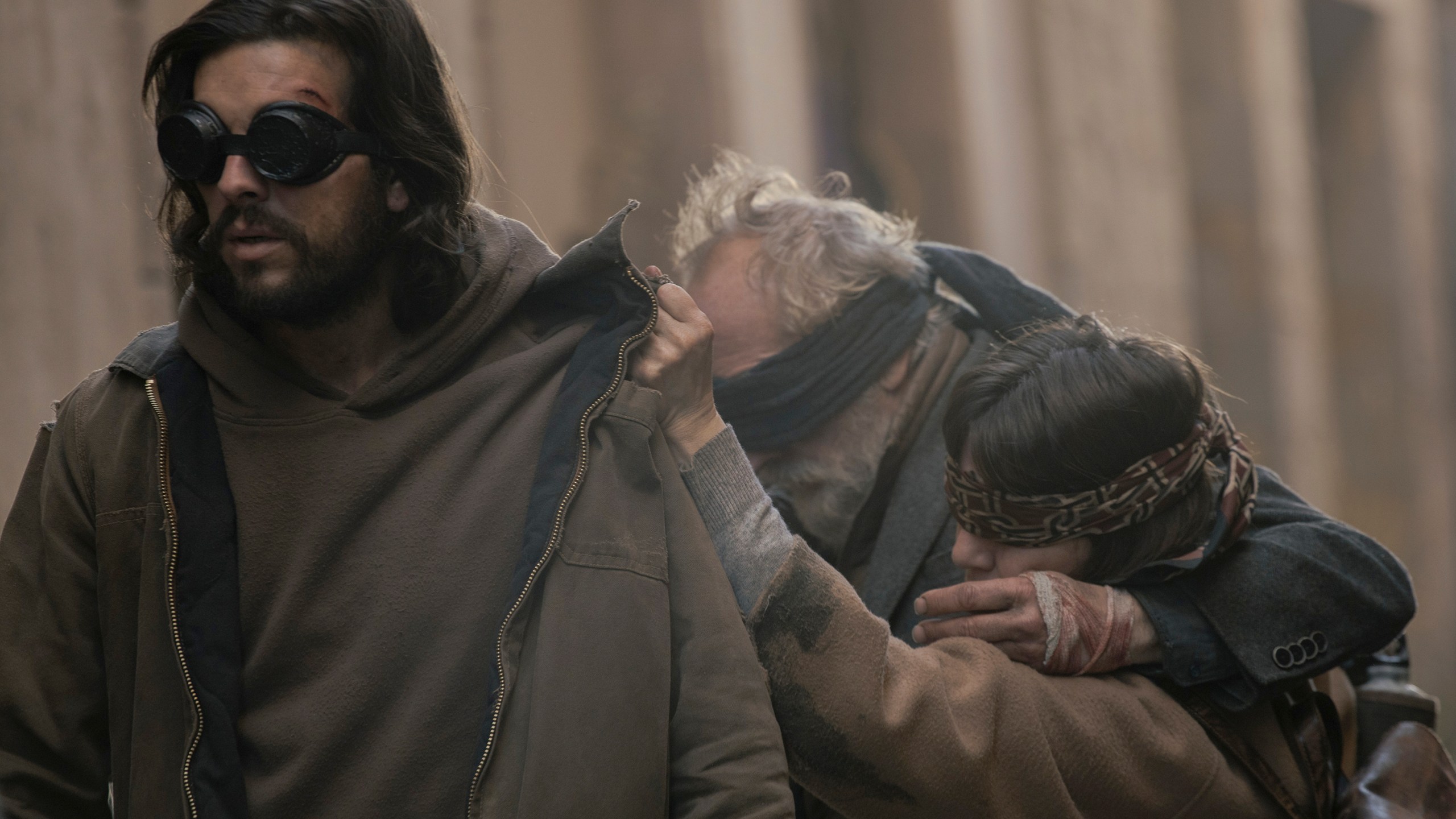 This image released by Netflix shows, from left, Mario Casas, Gonzalo de Castro, and Lola Dueñas in a scene from "Bird Box: Barcelona." (Andrea Resmini/Netflix via AP)