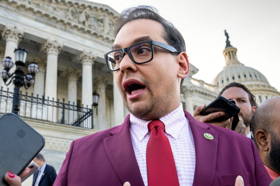 FILE - U.S. Rep. George Santos, R-N.Y., speaks to reporters outside the Capitol, in Washington, May 17, 2023. Santos, charged with a host of financial crimes, including embezzling money from his campaign, withdrew $85,000 from his campaign to help repay hundreds of thousands of dollars he loaned himself to get elected in 2022. (AP Photo/J. Scott Applewhite, File)