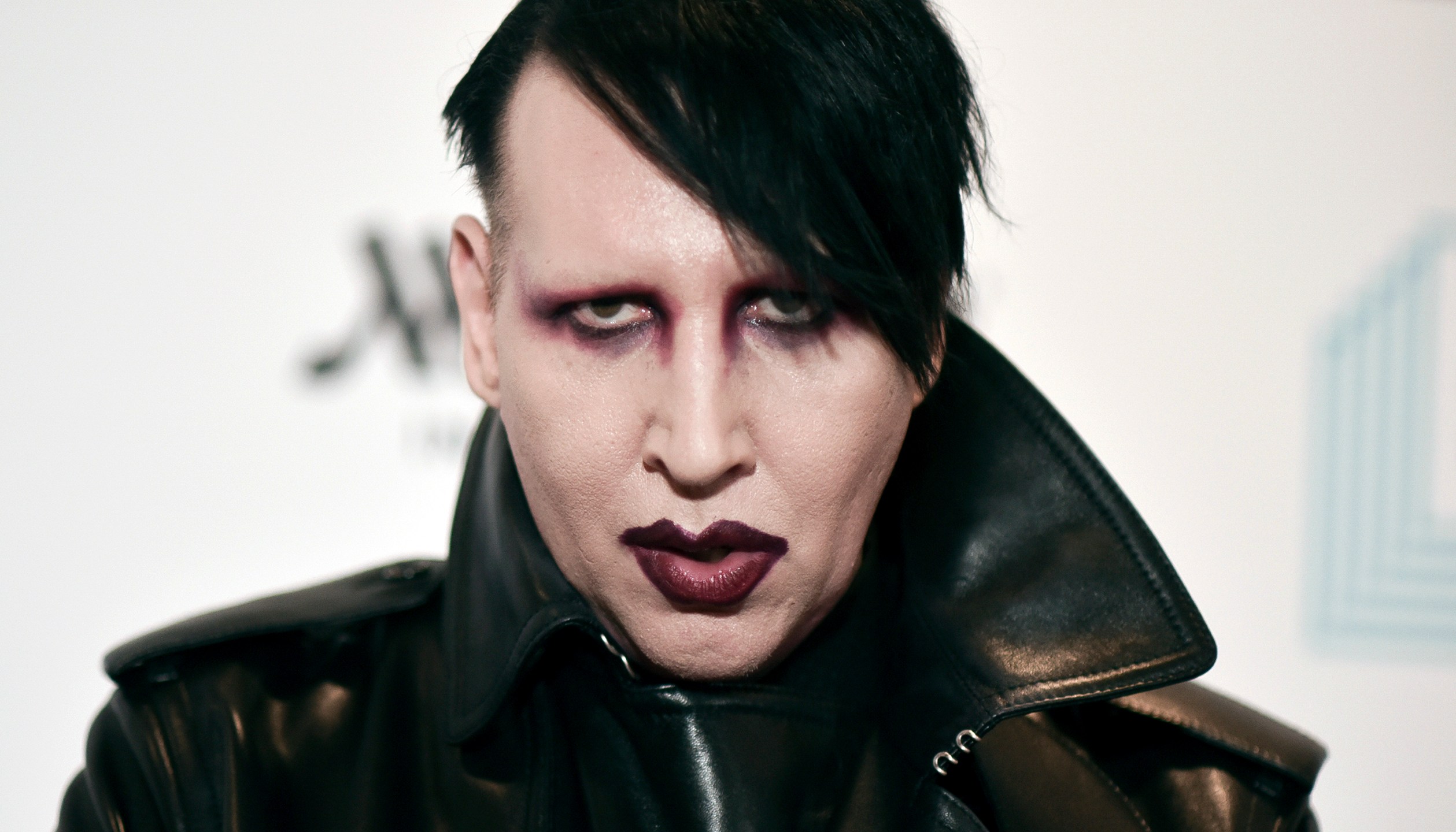 FILE - Marilyn Manson attends the 9th annual "Home for the Holidays" benefit concert in Los Angeles, on Dec. 10, 2019. An attorney in New Hampshire has filed a notice of intent to plead no contest on behalf of musical artist Marilyn Manson, who is accused of spitting and blowing his nose on a videographer at a 2019 concert. Manson, whose legal name is Brian Warner, is expected to plead no contest to just one of the misdemeanors on Thursday, July 20, 2023. (Photo by Richard Shotwell/Invision/AP, File)