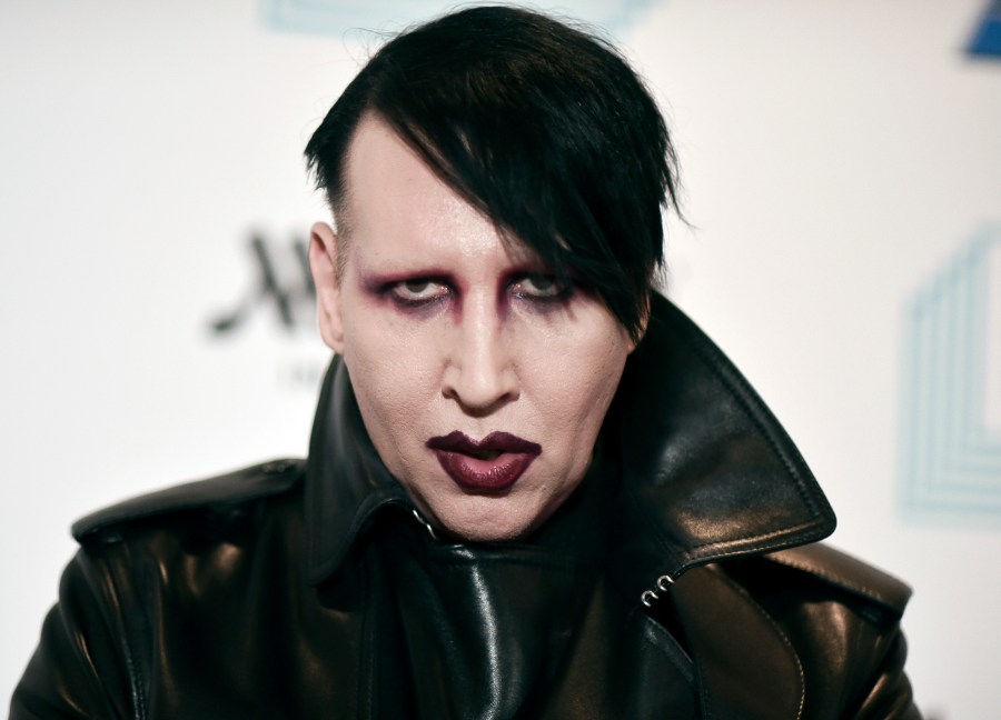 FILE - Marilyn Manson attends the 9th annual "Home for the Holidays" benefit concert in Los Angeles, on Dec. 10, 2019. An attorney in New Hampshire has filed a notice of intent to plead no contest on behalf of musical artist Marilyn Manson, who is accused of spitting and blowing his nose on a videographer at a 2019 concert. Manson, whose legal name is Brian Warner, is expected to plead no contest to just one of the misdemeanors on Thursday, July 20, 2023. (Photo by Richard Shotwell/Invision/AP, File)