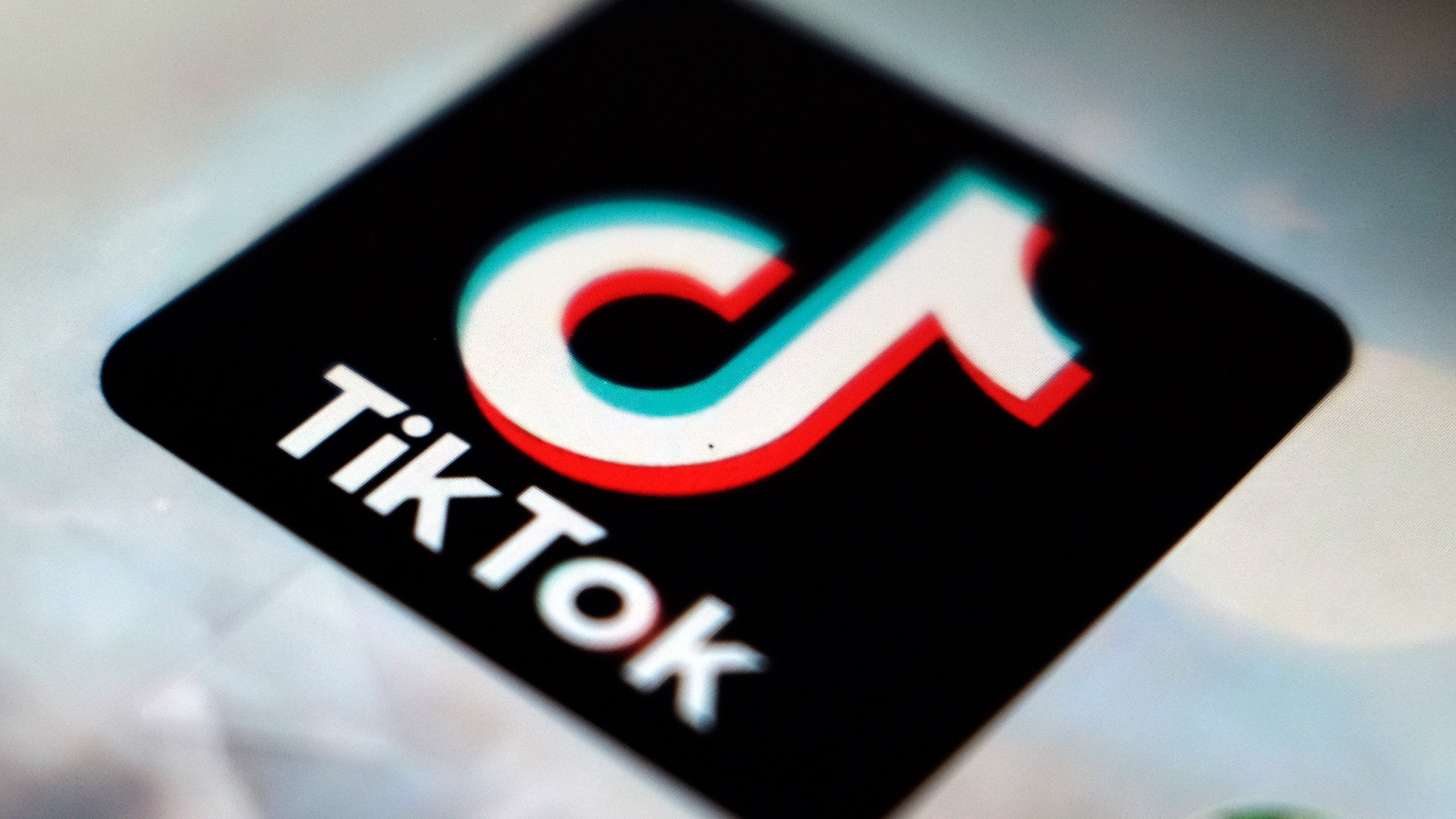 FILE - The TikTok app logo, in Tokyo, on Sept. 28, 2020. TikTok needs to do more to get ready for new European Union digital rules designed to keep users safe online, a top official said Tuesday July 18, 2023. (AP Photo/Kiichiro Sato, File)