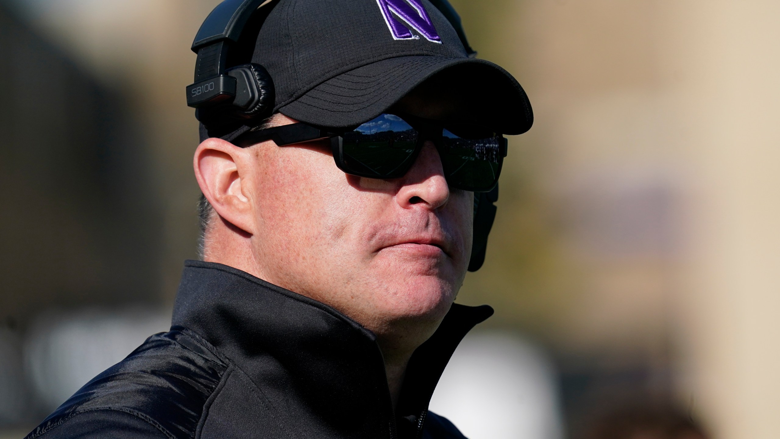 FILE - Northwestern head coach Pat Fitzgerald watches his team during the second half of an NCAA college football game against Rutgers in Evanston, Ill., Oct. 16, 2021. Northwestern has fired Fitzgerald Monday, July 10, 2023, amid a hazing scandal that called into question his leadership of the program and damaged the university's reputation after it mishandled its response to the allegations. (AP Photo/Nam Y. Huh, File)