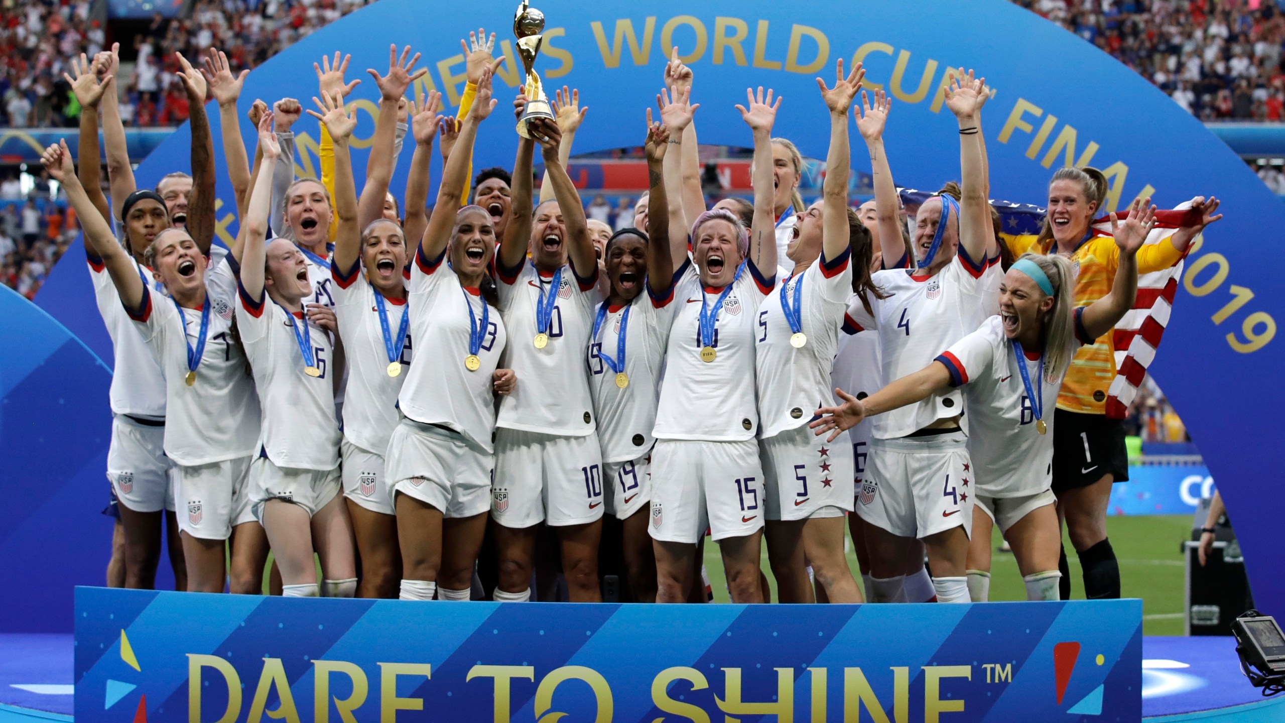 FILE - The United States' team celebrate with the trophy after winning the Women's World Cup final soccer match between against Netherlands at the Stade de Lyon in Decines, outside Lyon, France. (AP Photo/Alessandra Tarantino, File)