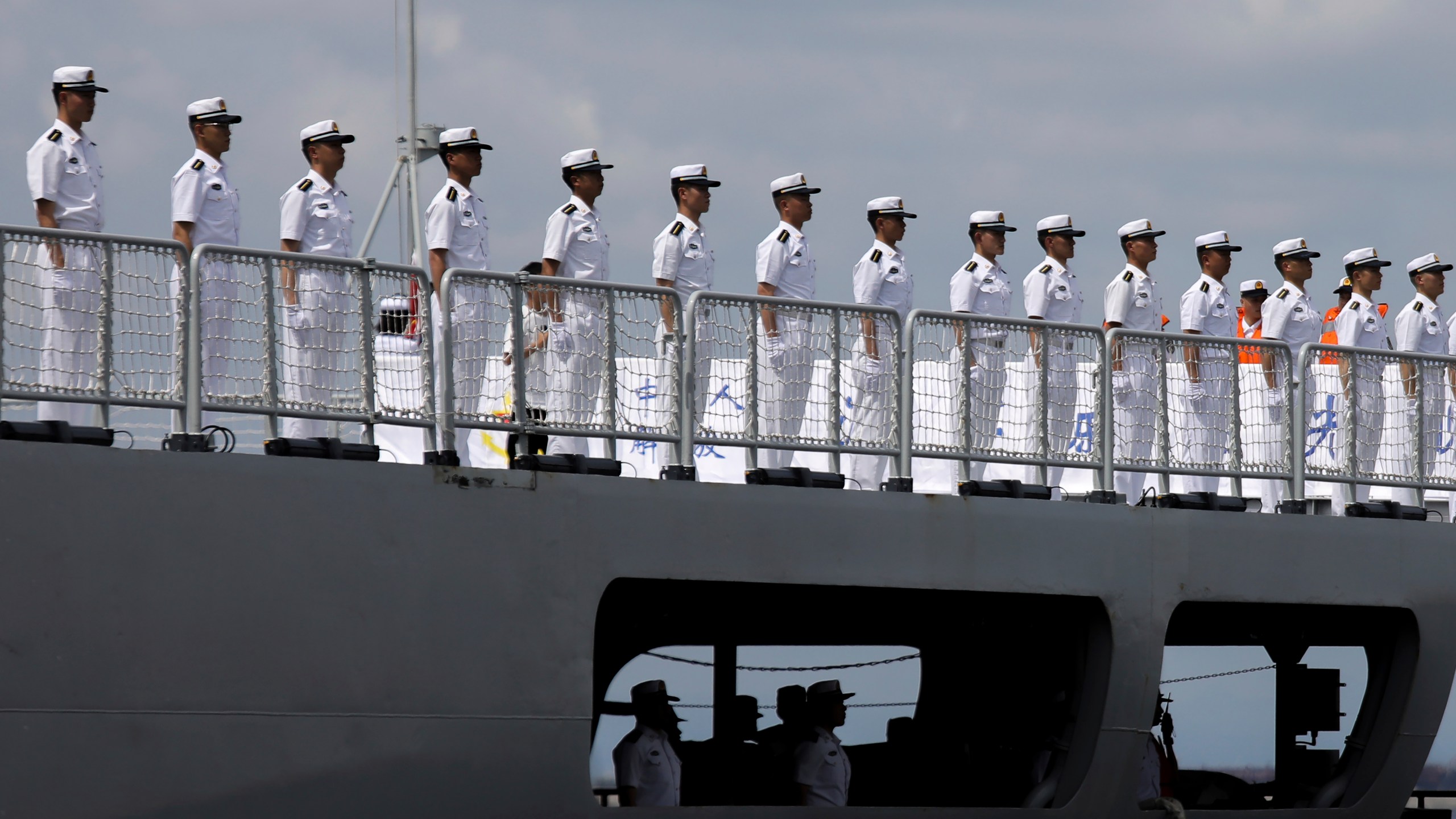 FILE - Chinese navy sailors stand in formation on board the naval training ship, Qi Jiguang, as it docks at Manila's port, Philippines Wednesday, June 14, 2023. China says it's navy ships are preparing for joint exercises with Russia's sea forces in a sign of Beijing's continuing support for Moscow's invasion of neighboring Ukraine. (AP Photo/Basilio Sepe, File)