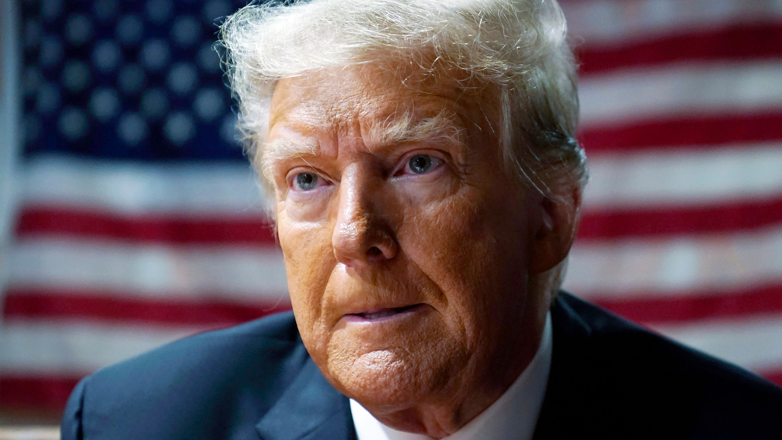 FILE - Former President Donald Trump speaks with supporters at the Westside Conservative Breakfast, June 1, 2023, in Des Moines, Iowa. A federal judge upheld a $5 million jury verdict against Donald Trump on Wednesday, rejecting the former president’s claim that the award was excessive and that a jury in a civil case vindicated him by failing to conclude that he raped a columnist in a luxury department store dressing room in the 1990s. (AP Photo/Charlie Neibergall, File)